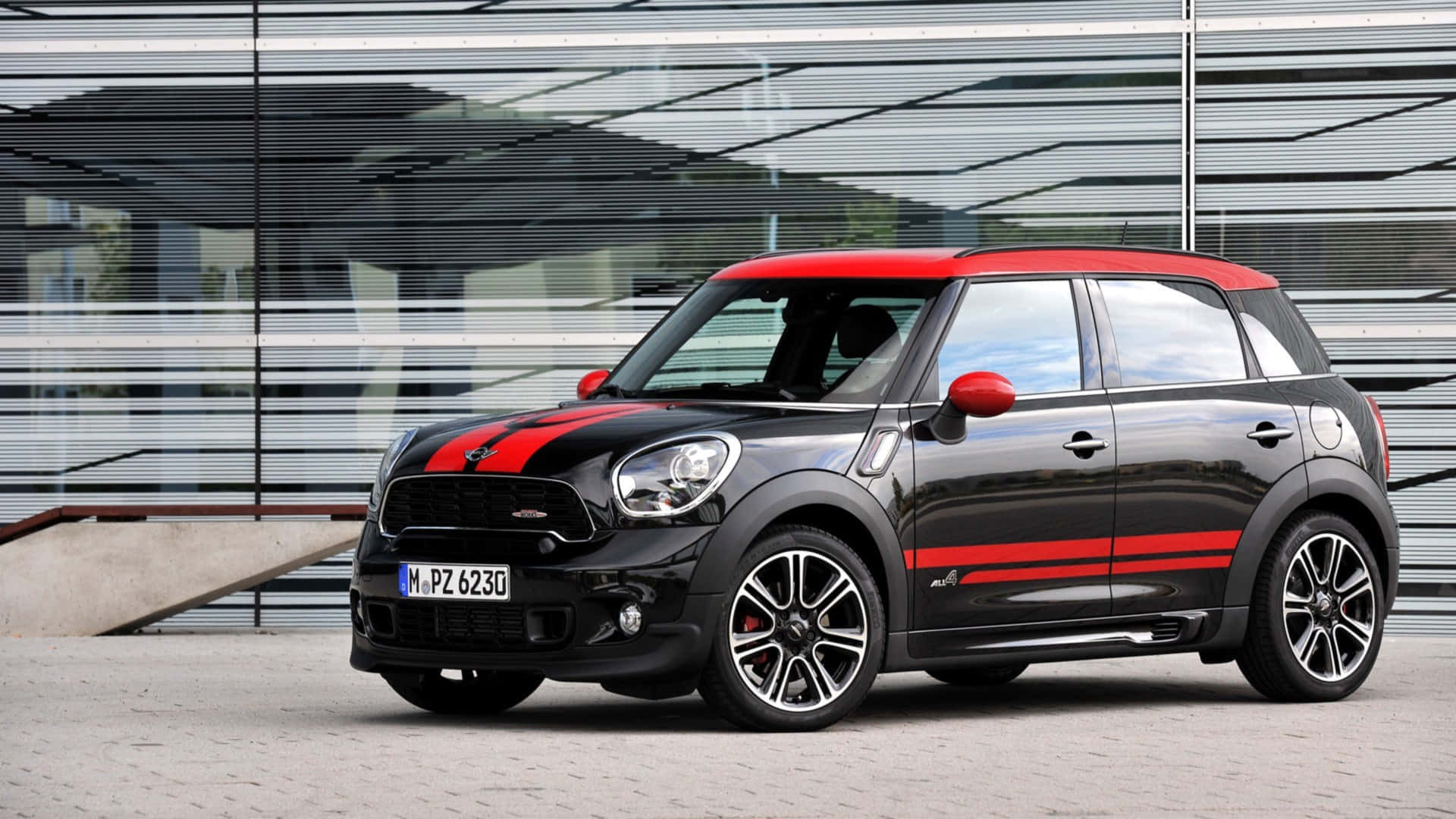 Sleek Mini Paceman Cruising On An Open Road Wallpaper