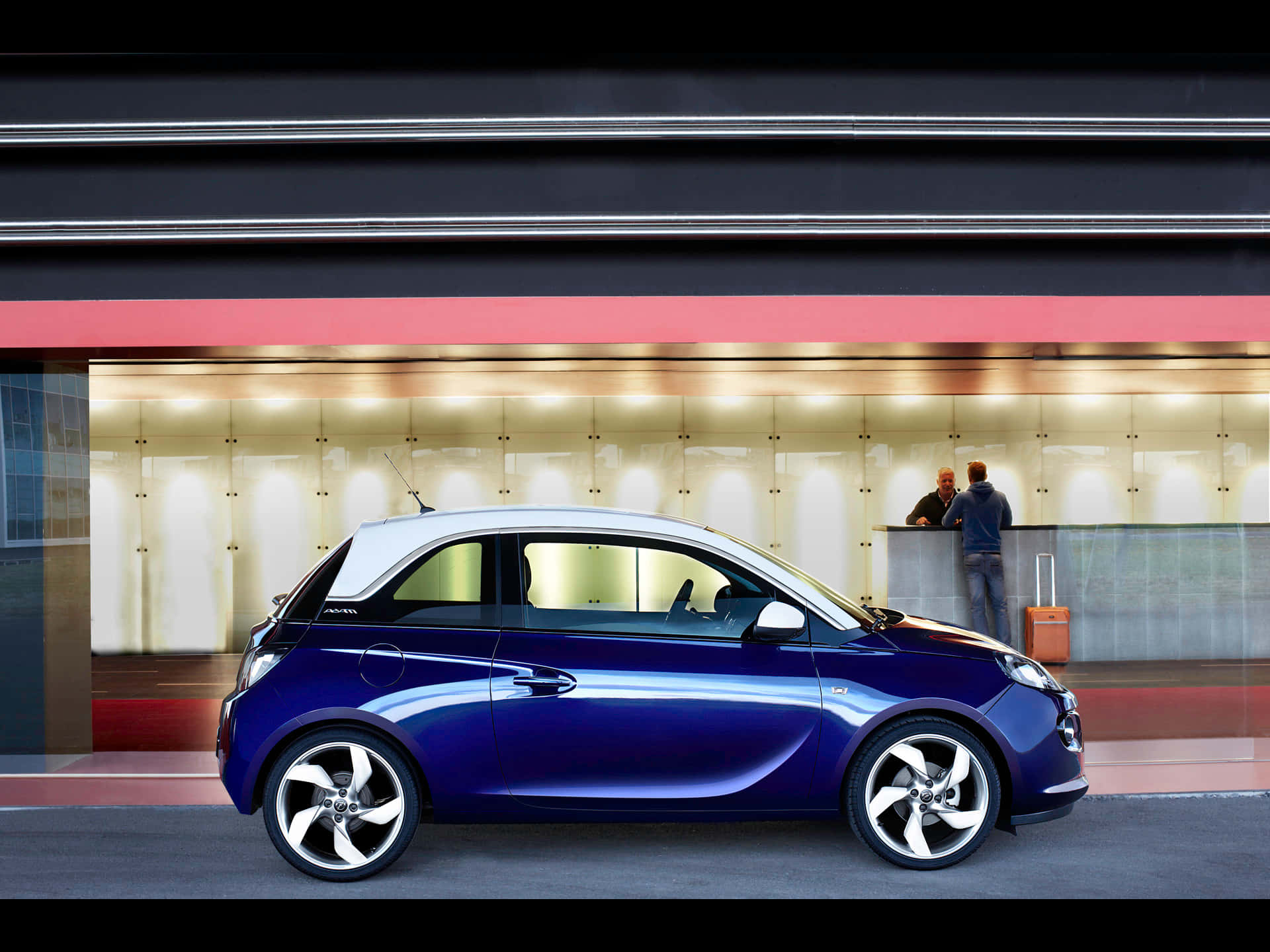 Sleek Opel Adam In Urban Setting Wallpaper