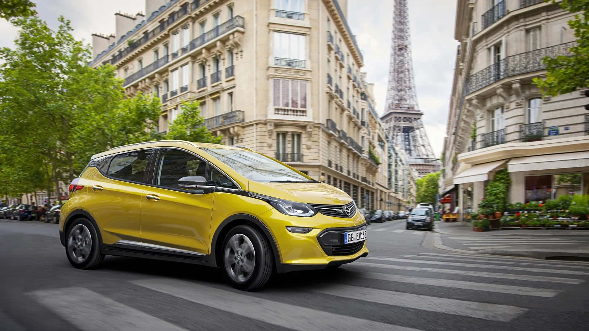 Sleek Opel Ampera In An Urban Setting Wallpaper