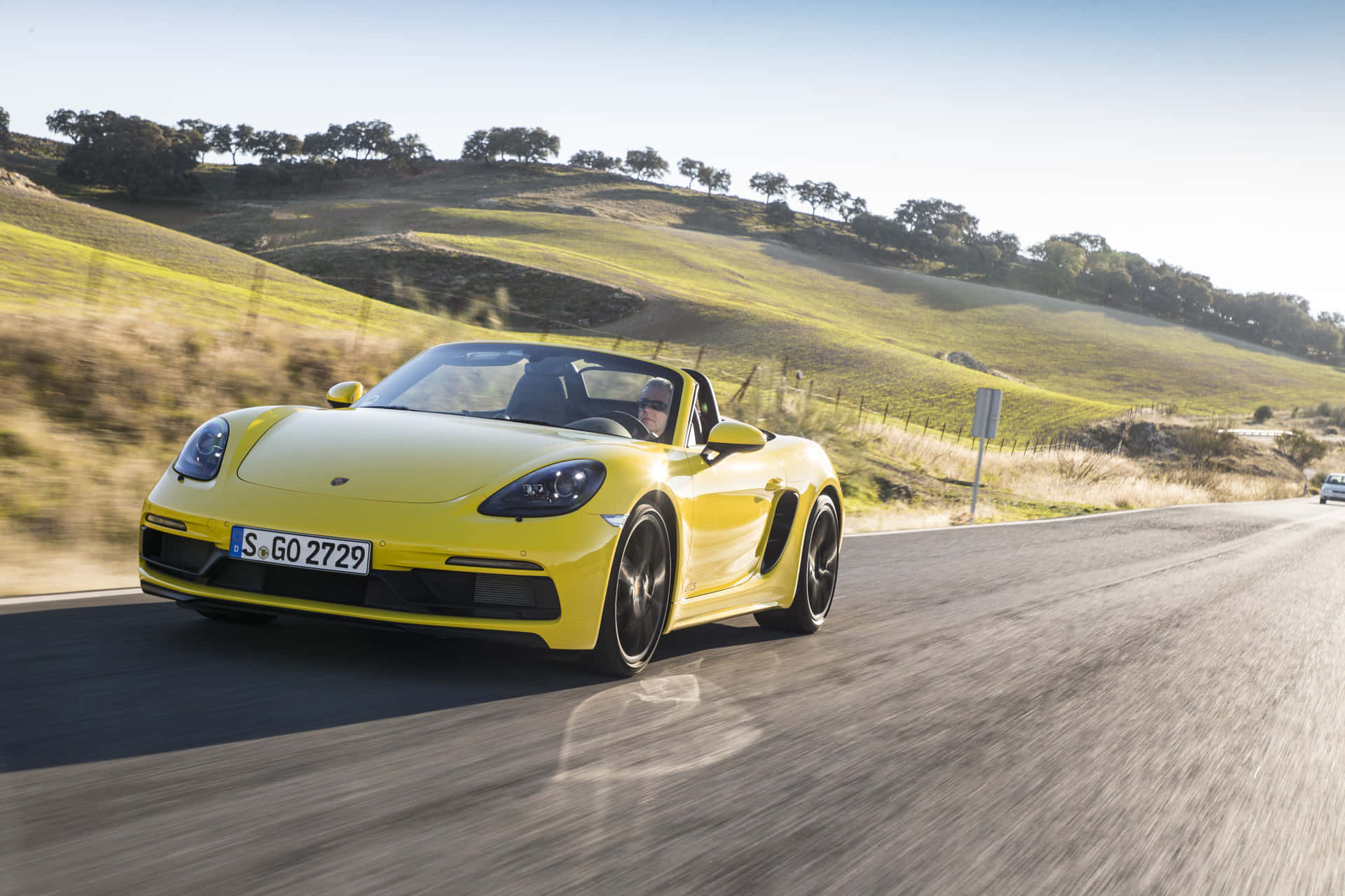 Sleek Porsche 718 Boxster Gts Lit In The Dark Wallpaper