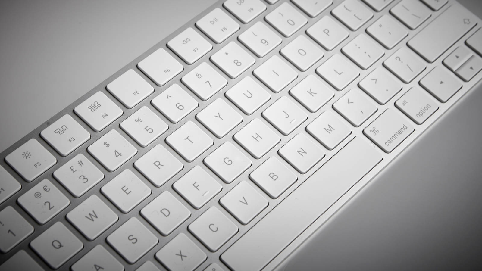 Sleek Silver Mac Computer Keyboard Wallpaper