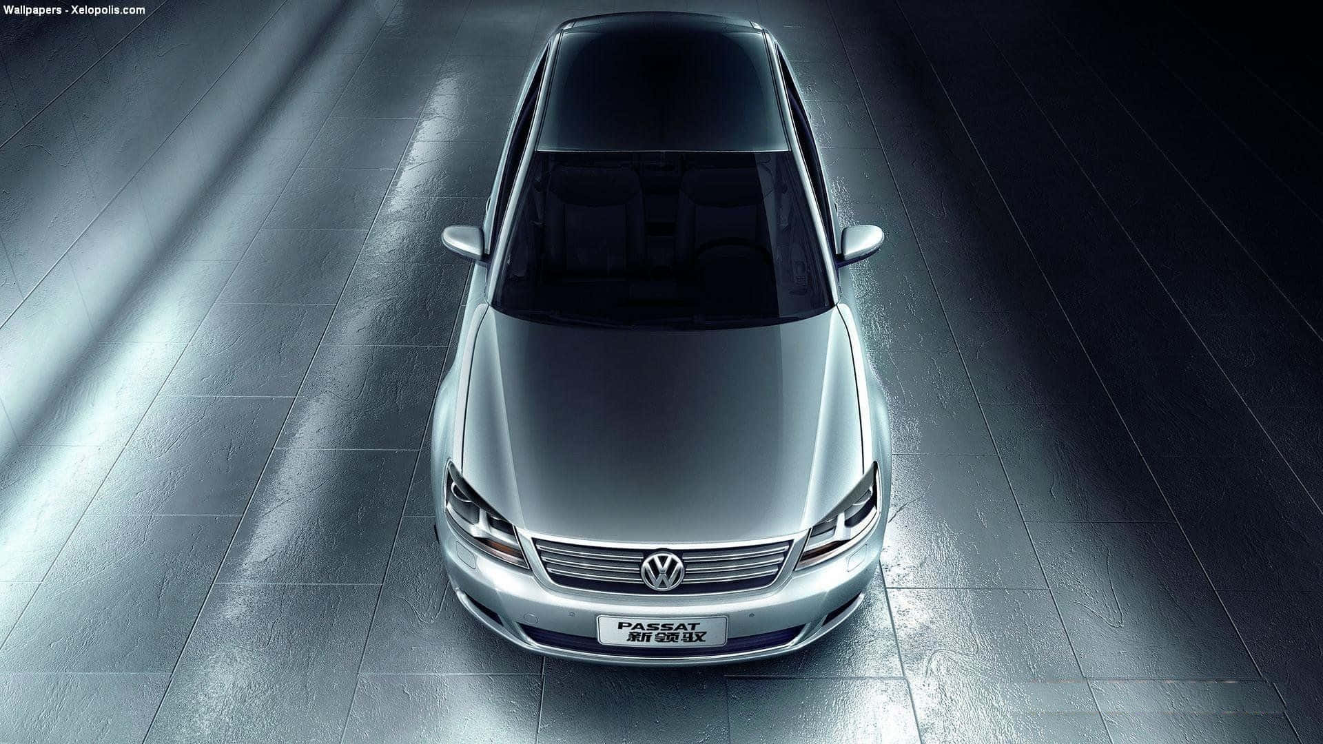 Sleek Volkswagen Passat Against A Dusk Sky Wallpaper