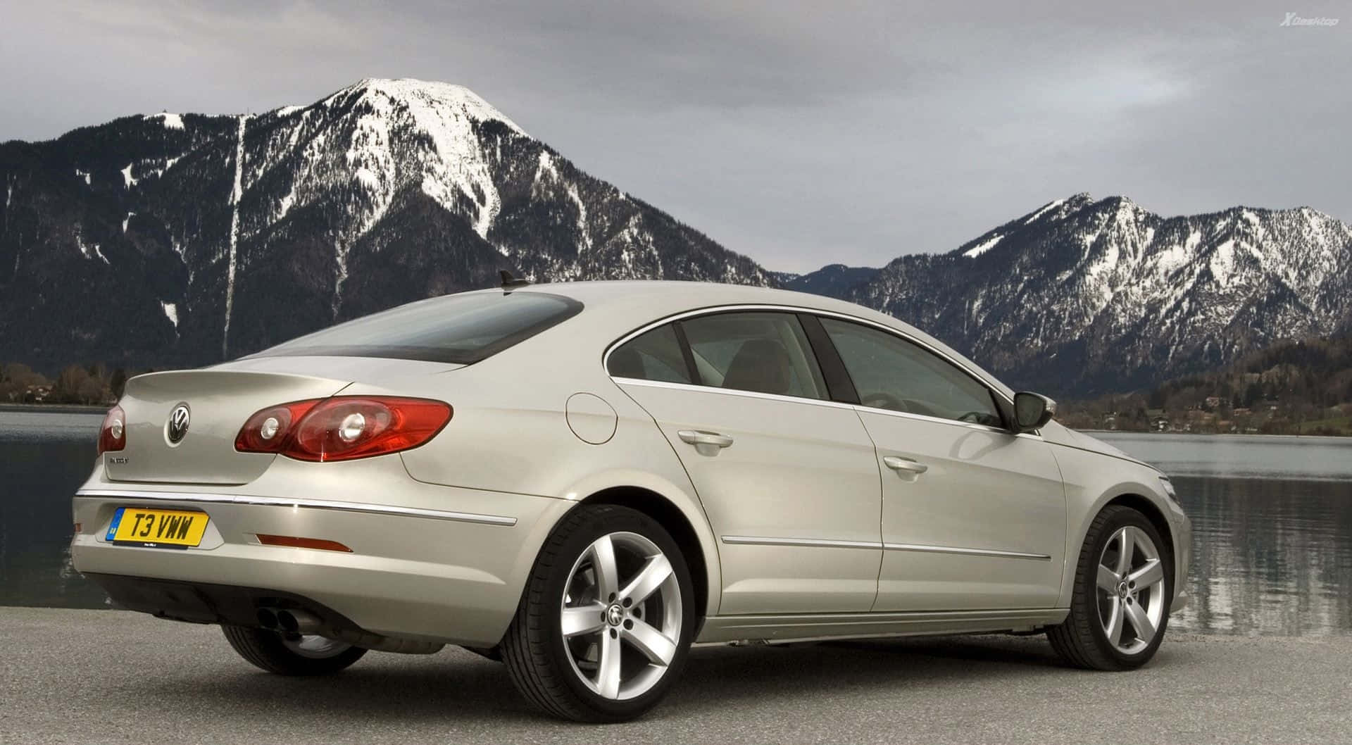 Sleek Volkswagen Passat Cc Against Cityscape Wallpaper