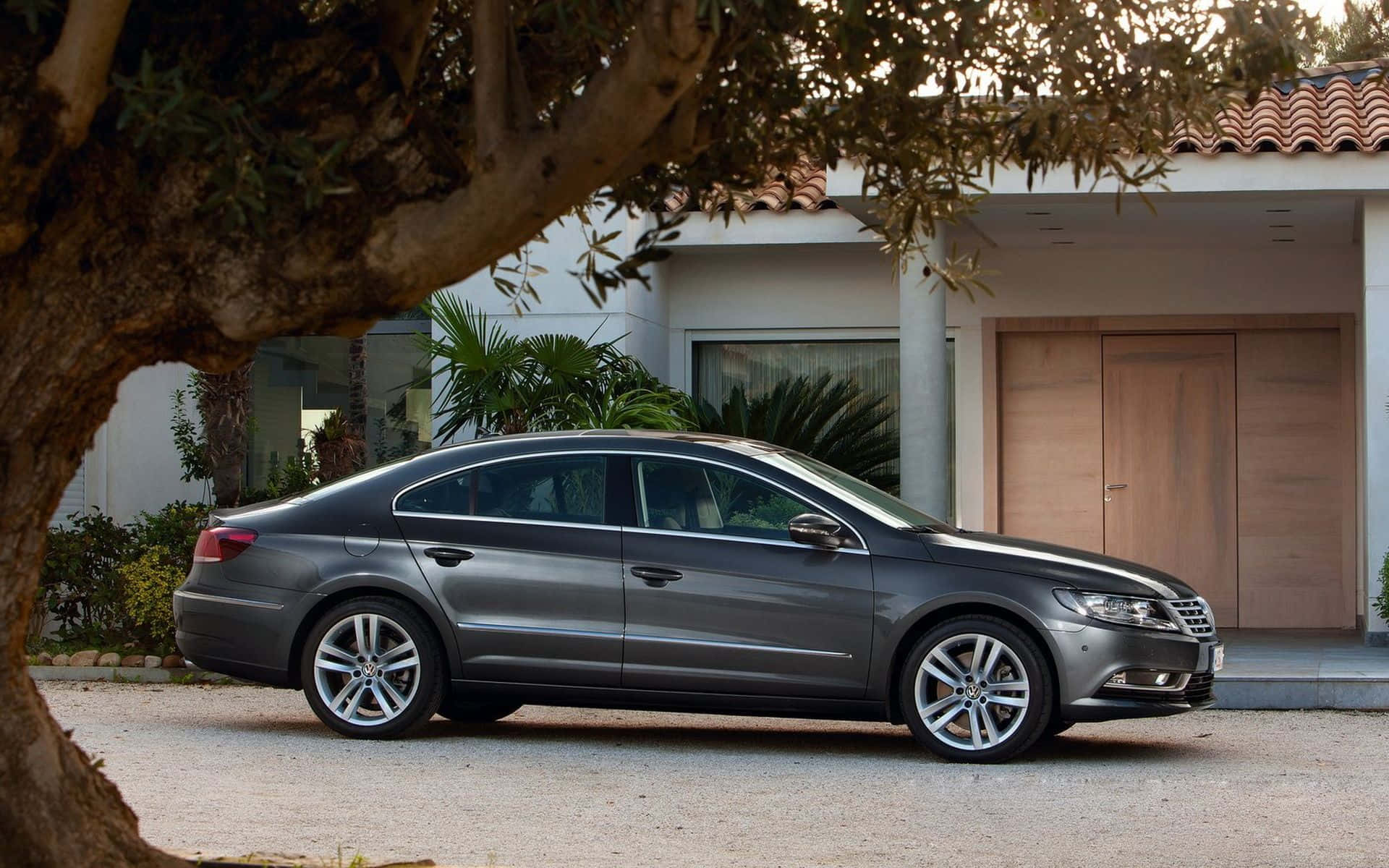 Sleek Volkswagen Passat Cc On The Move Wallpaper