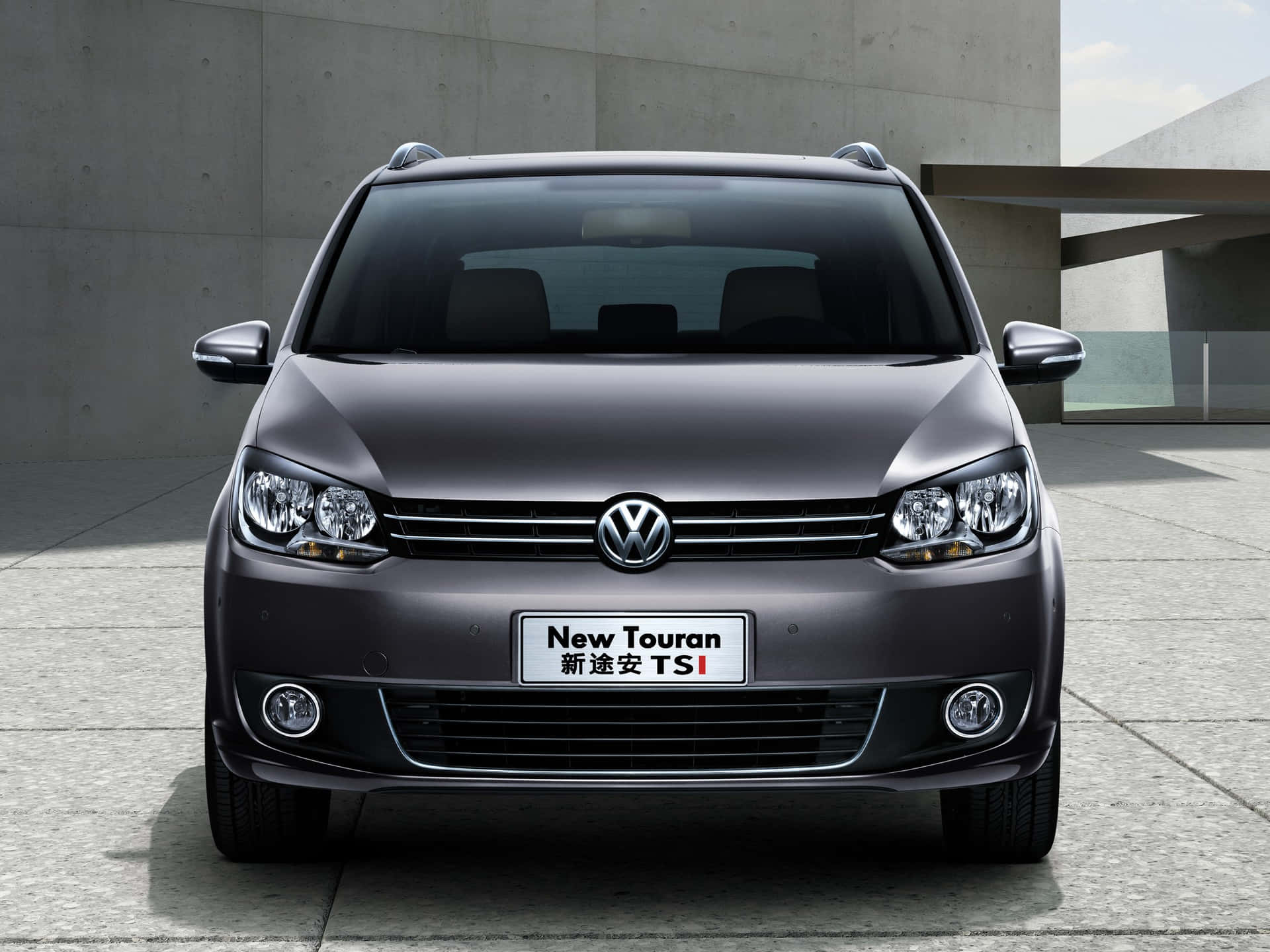 Sleek Volkswagen Touran In Action Wallpaper