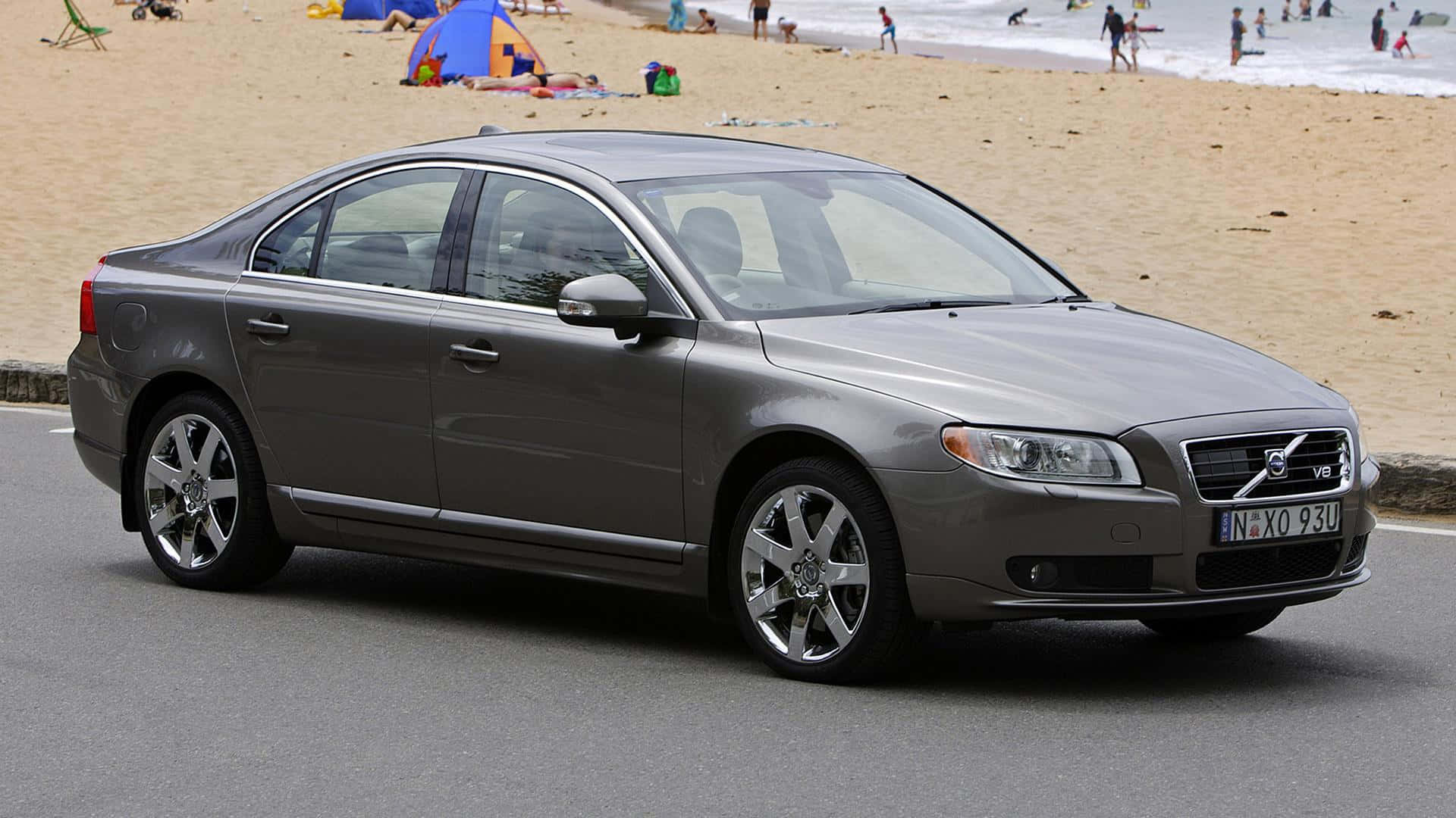 Sleek Volvo S80 On Urban Streets Wallpaper