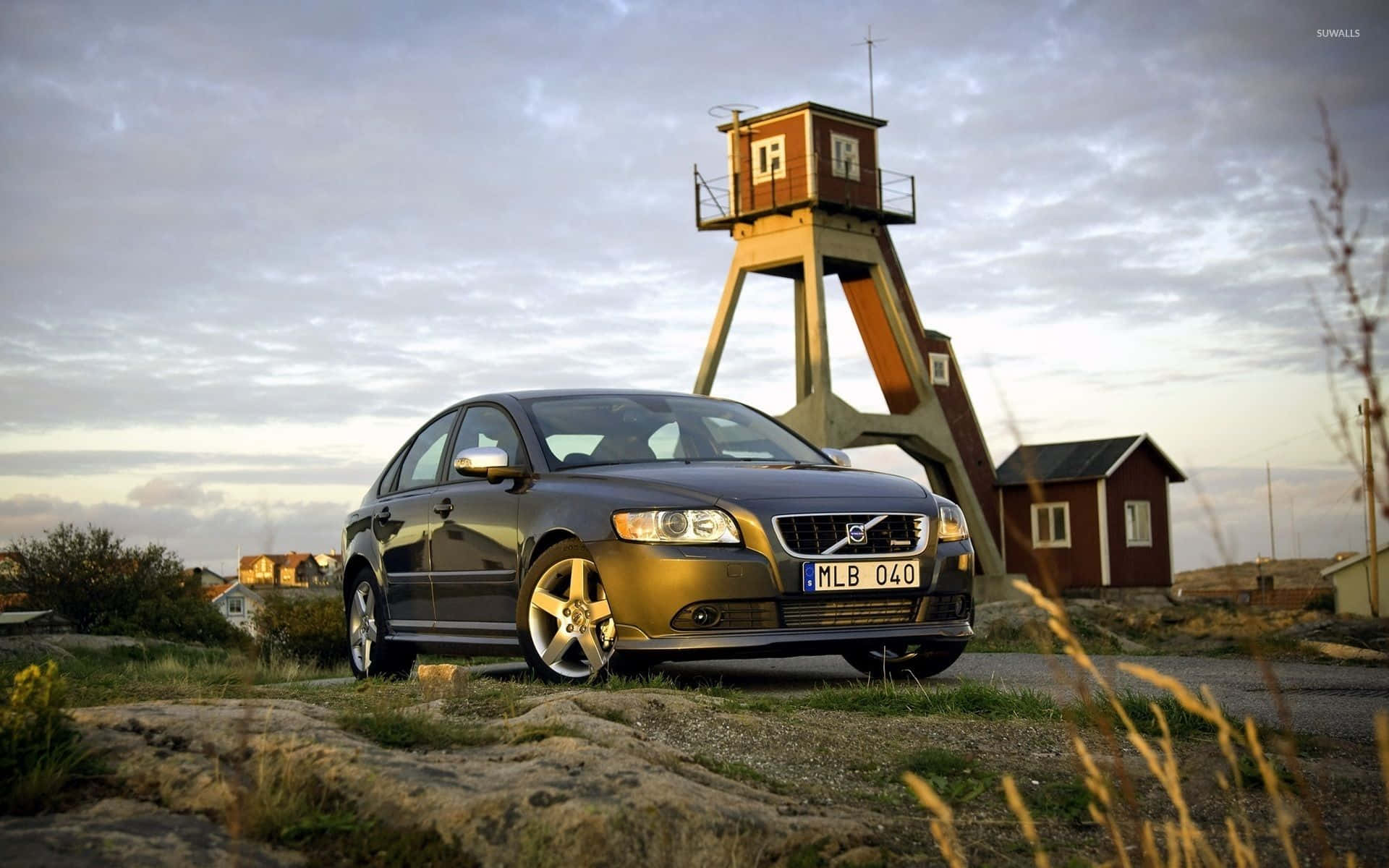 Sleek Volvo V40 Against A Scenic Backdrop. Wallpaper