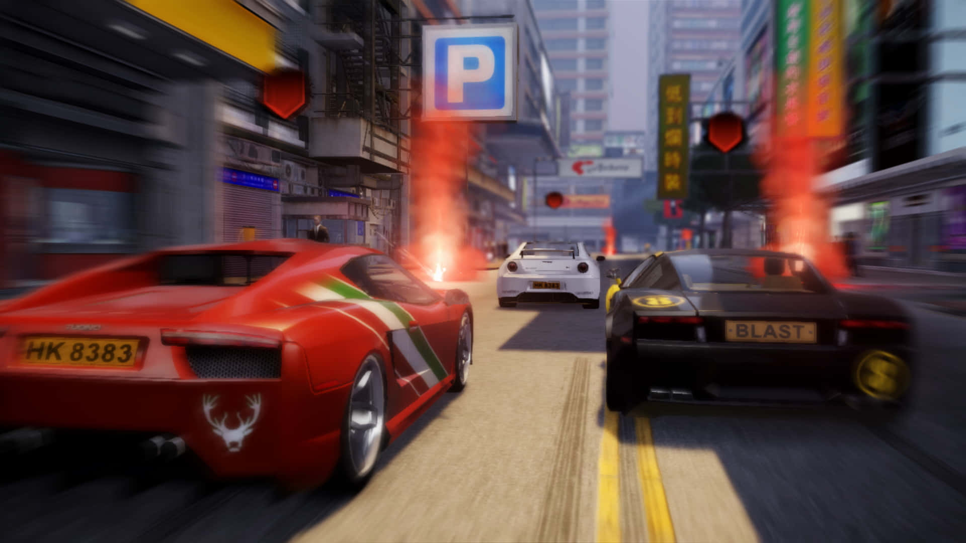 et skærmbillede af et racing spil med biler, der kører ned ad gaden Wallpaper