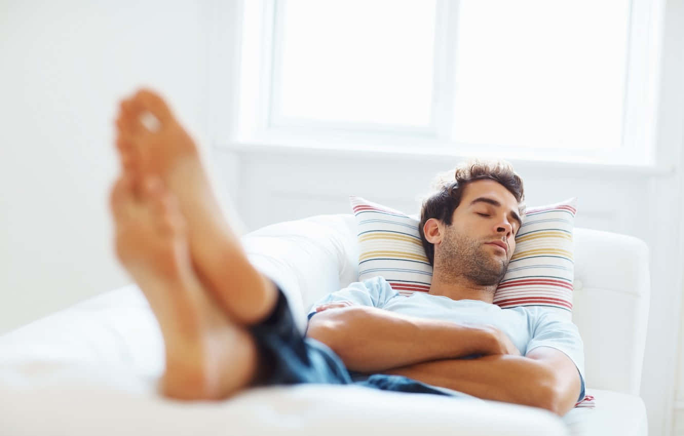 Sleeping Man In A Very Relaxed Position Wallpaper