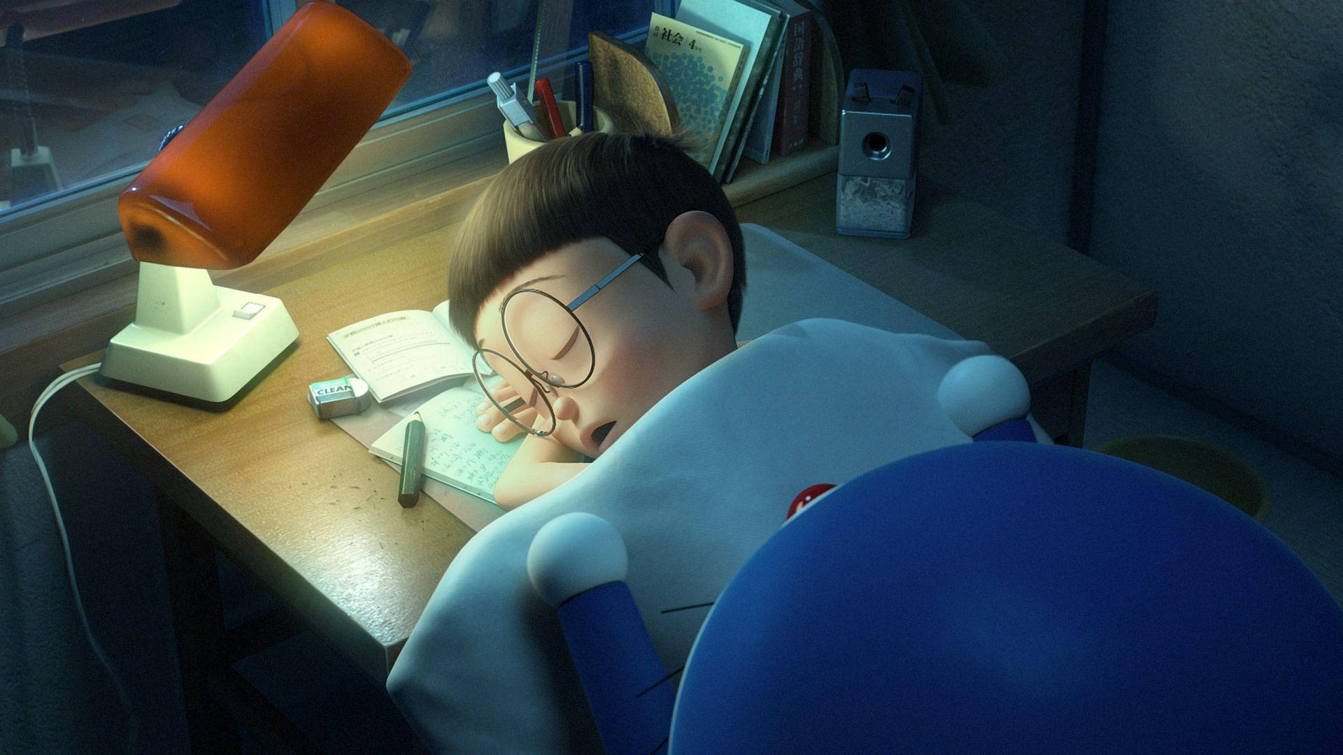 Sover Nobita på hans skrivebord Wallpaper