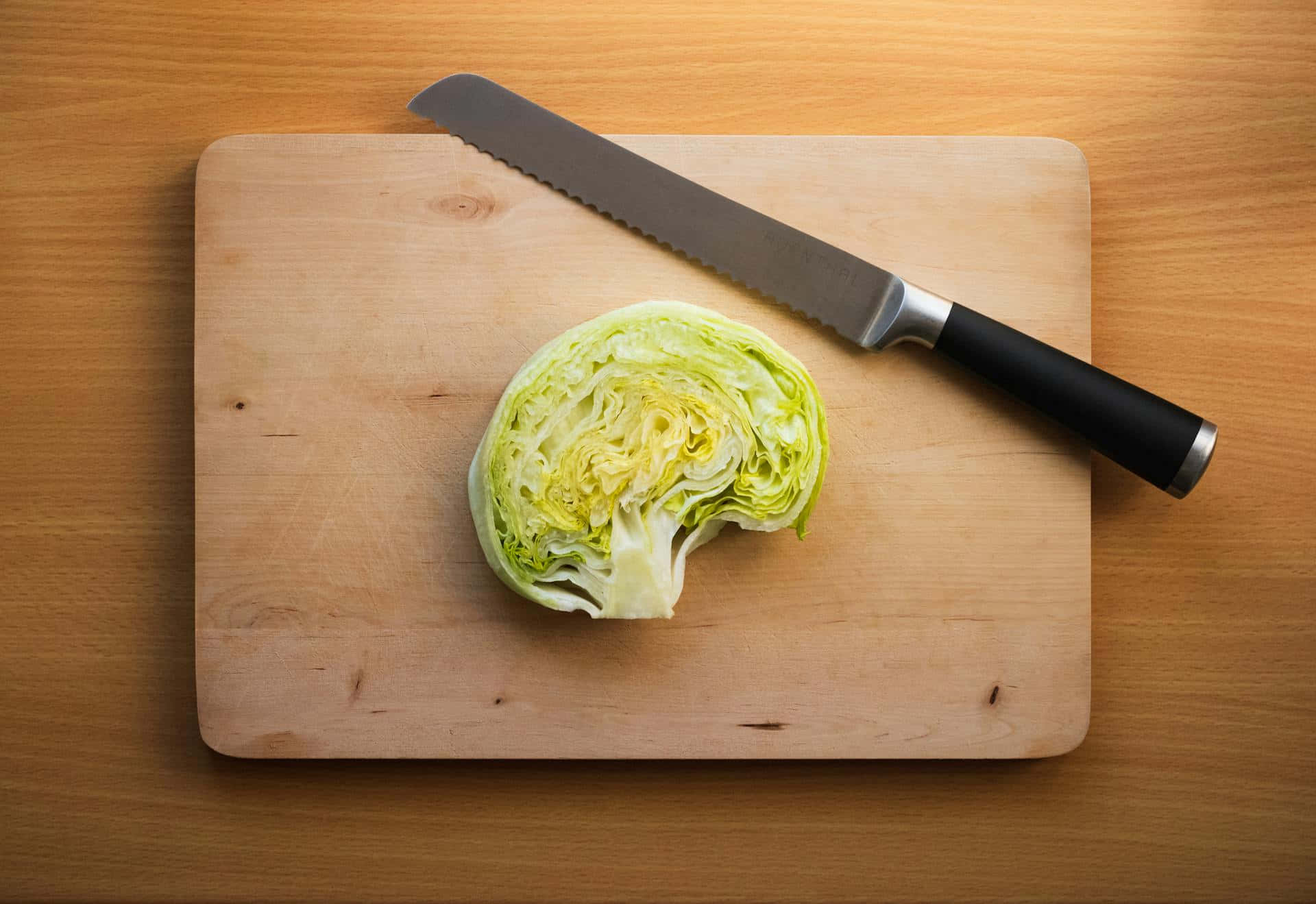 Sliced Cabbageon Wooden Cutting Board Wallpaper