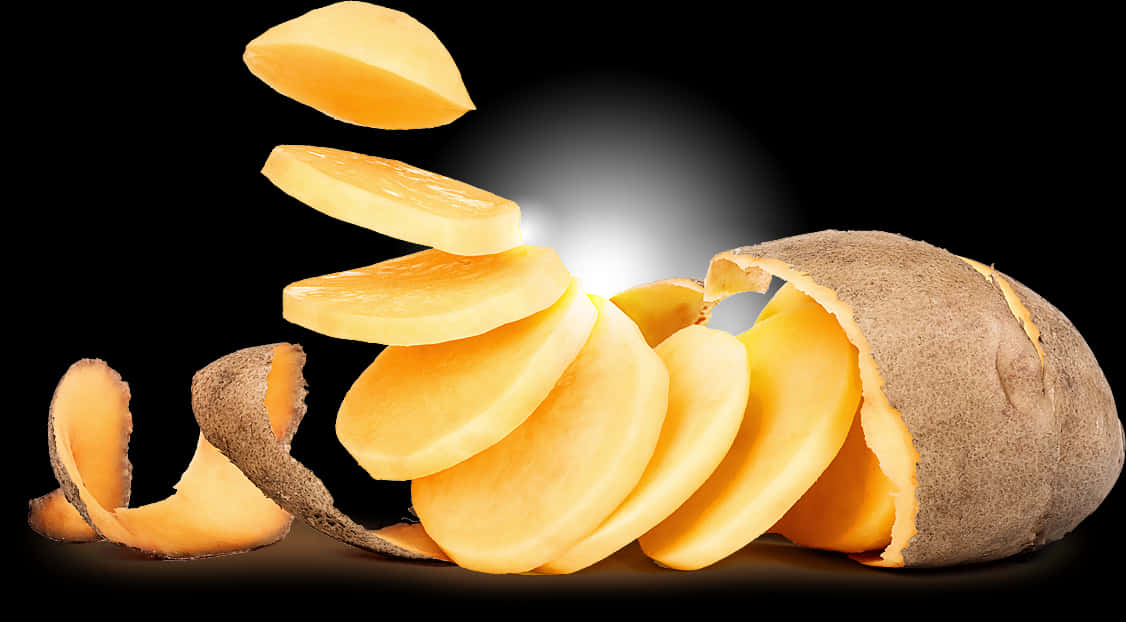 Sliced Potato Floating Against Black Background PNG