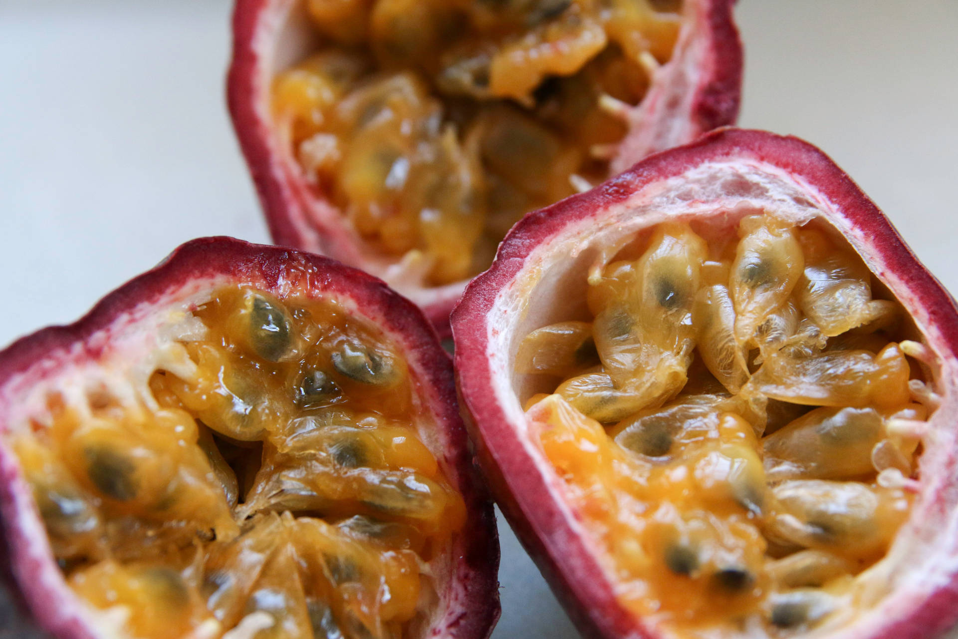 Sliced Ripe Passion Fruit Close Up Wallpaper