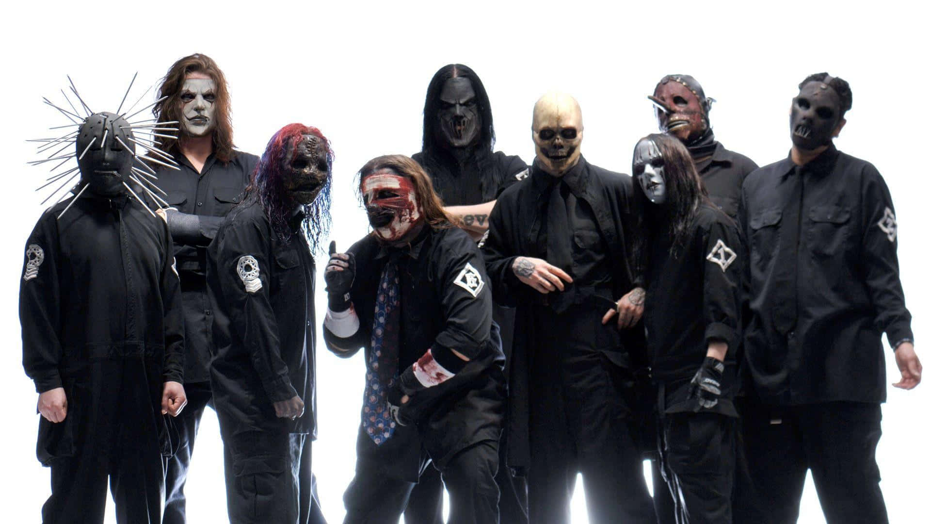 Slipknotskrivbordsbakgrund Med Manlig Grupp I Svarta Kostymer. Wallpaper