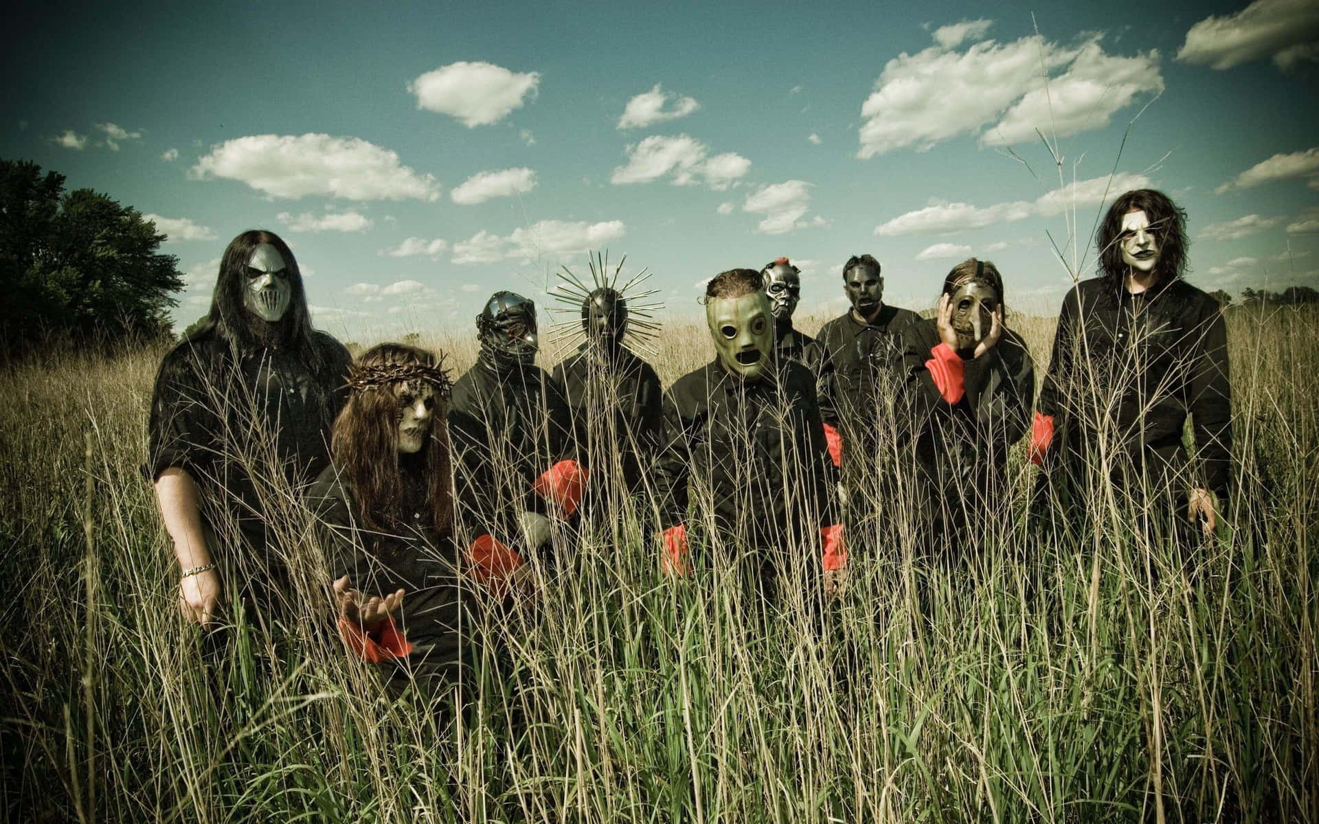 Slipknot Desktop Male Band Group In Field Wallpaper