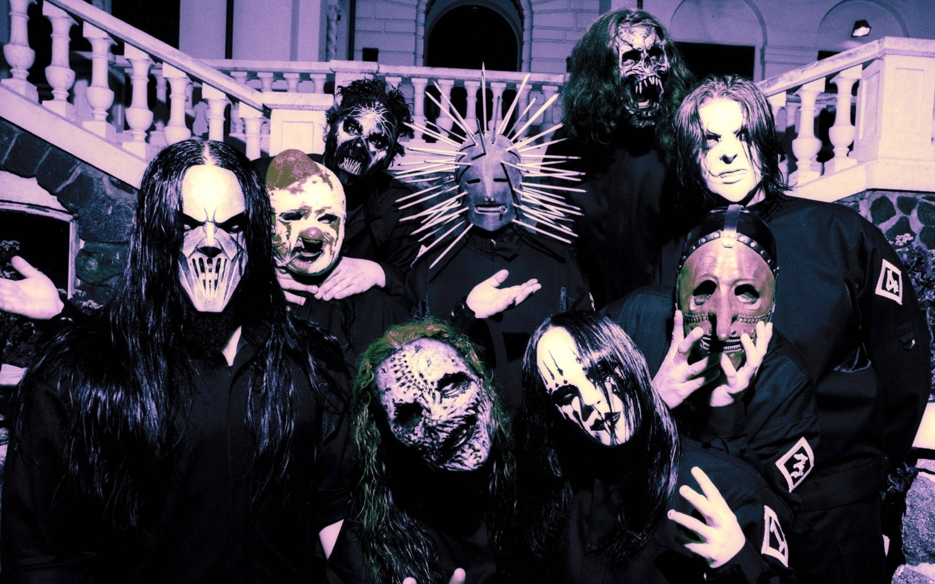 Slipknot Members Posing Near Staircase Background