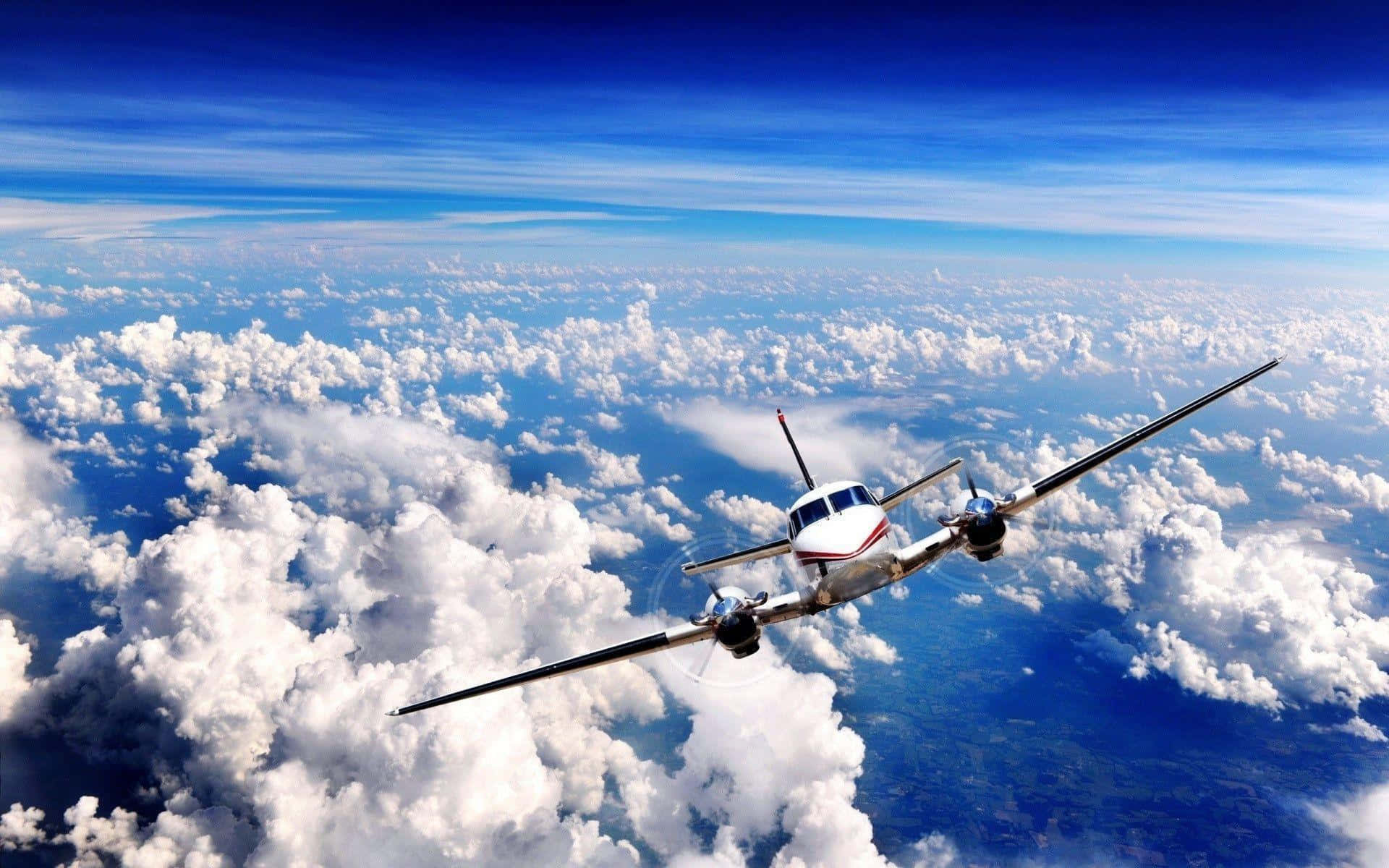 Small Airplane Skillfully Glides High Wallpaper