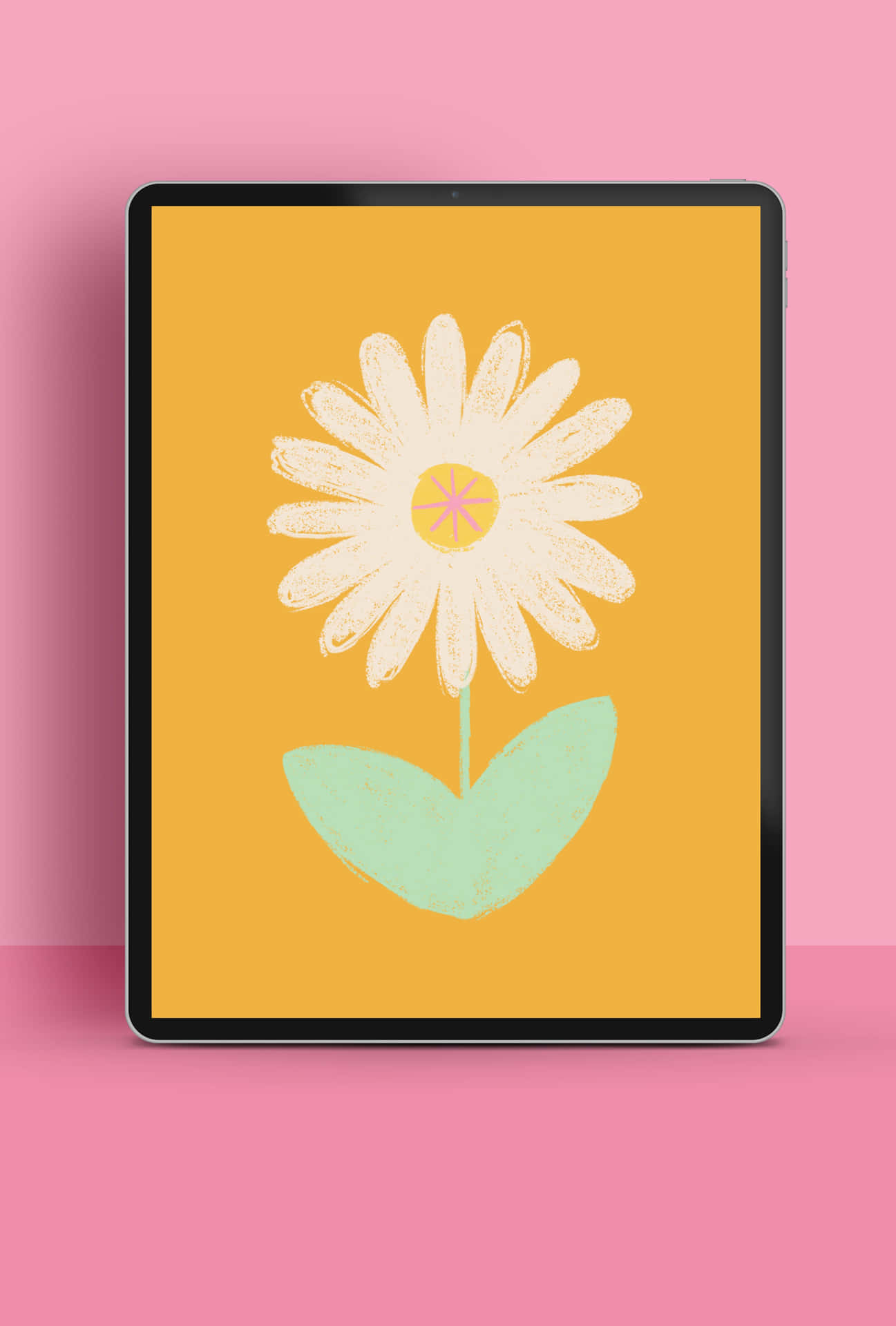 En tablet med en blomst på den. Wallpaper
