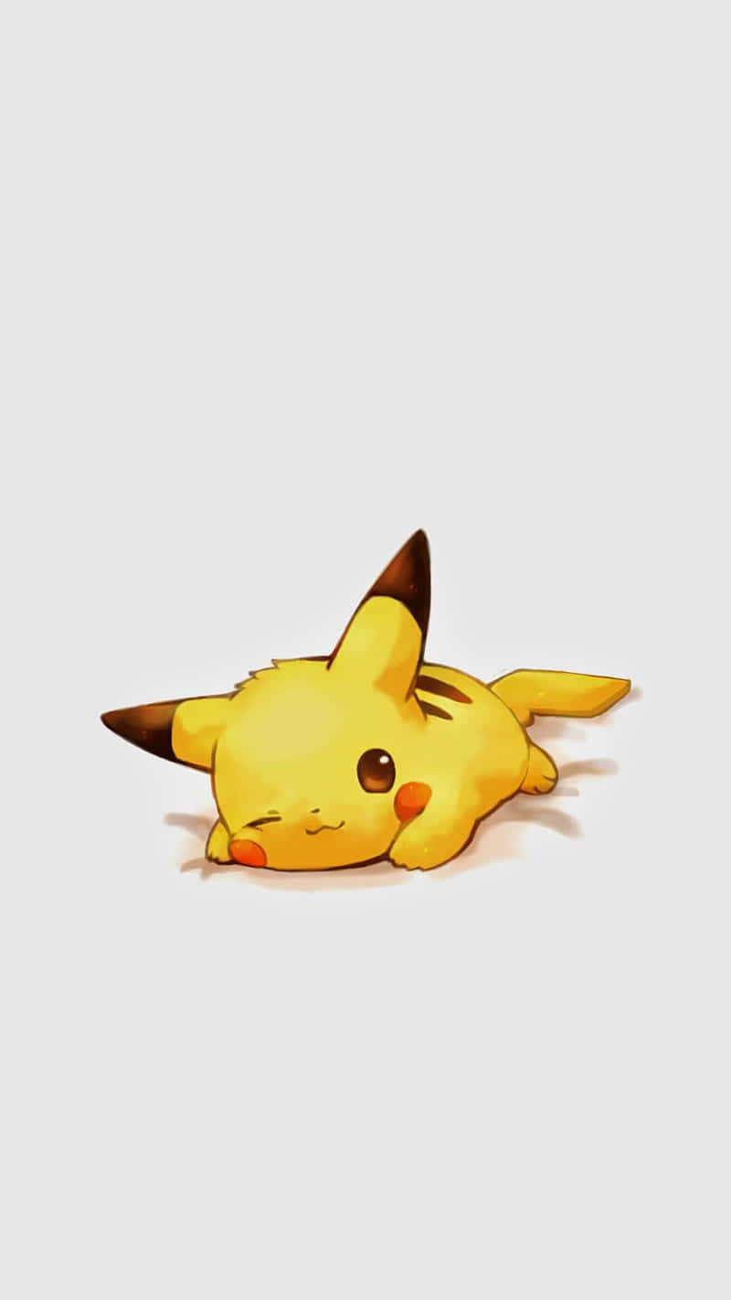 Pikachu liggende på jorden Wallpaper