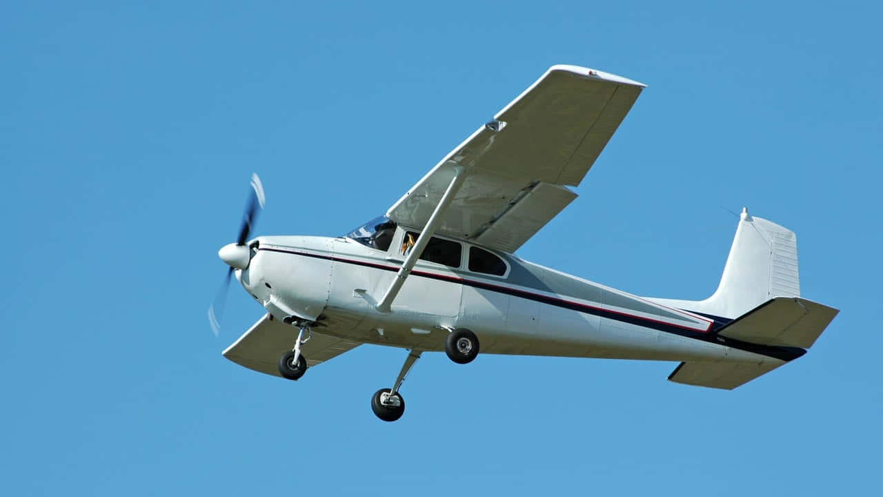 Blue Sky With White Small Plane Background