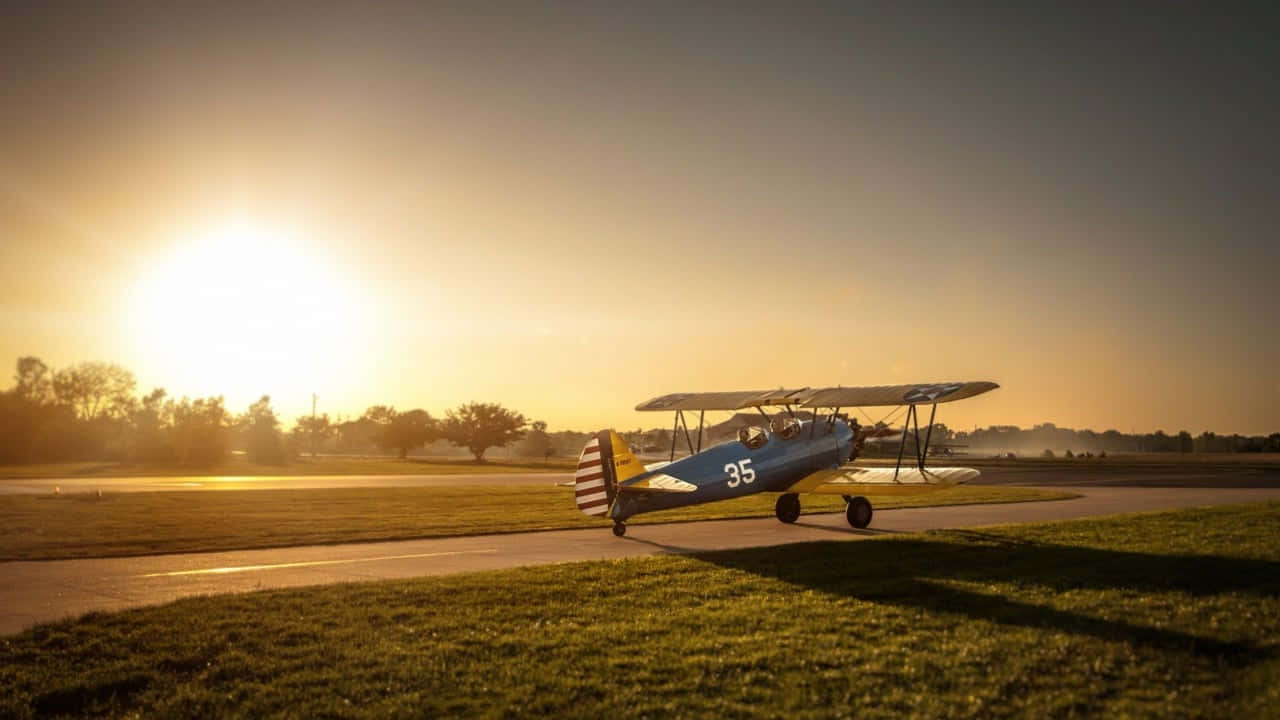 Sunny Day With Boeing Stearman Small Plane Background