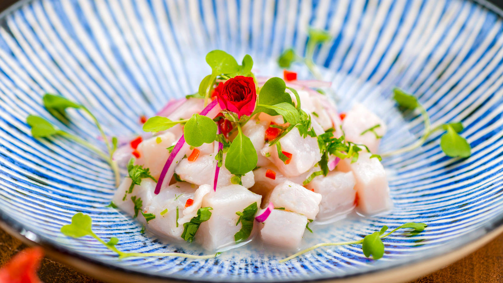 Small Serving Of Ceviche On Blue Bowl Wallpaper