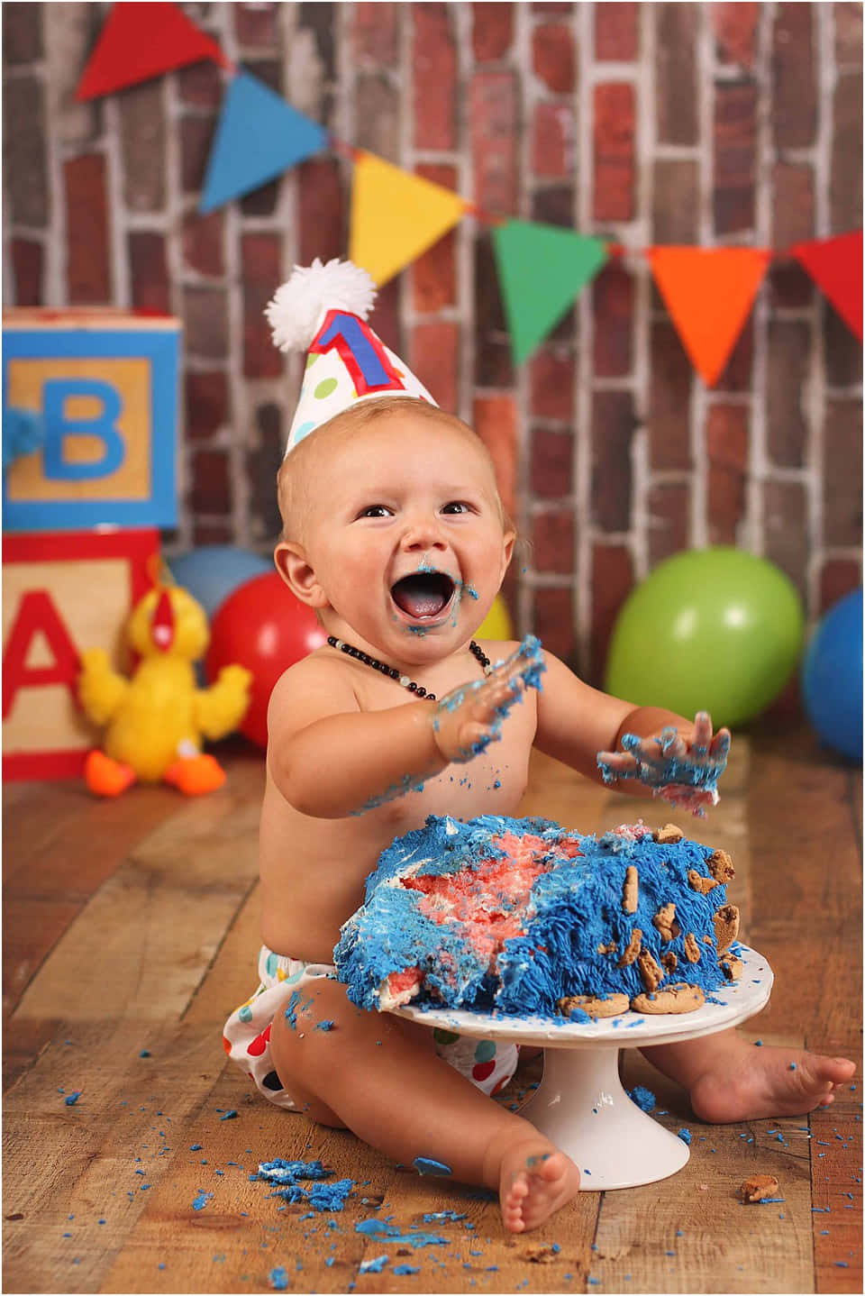 A Baby Is Eating Cake
