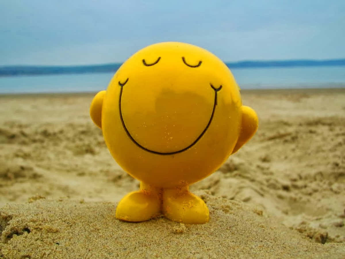 Smile Face Figure On Sand Picture