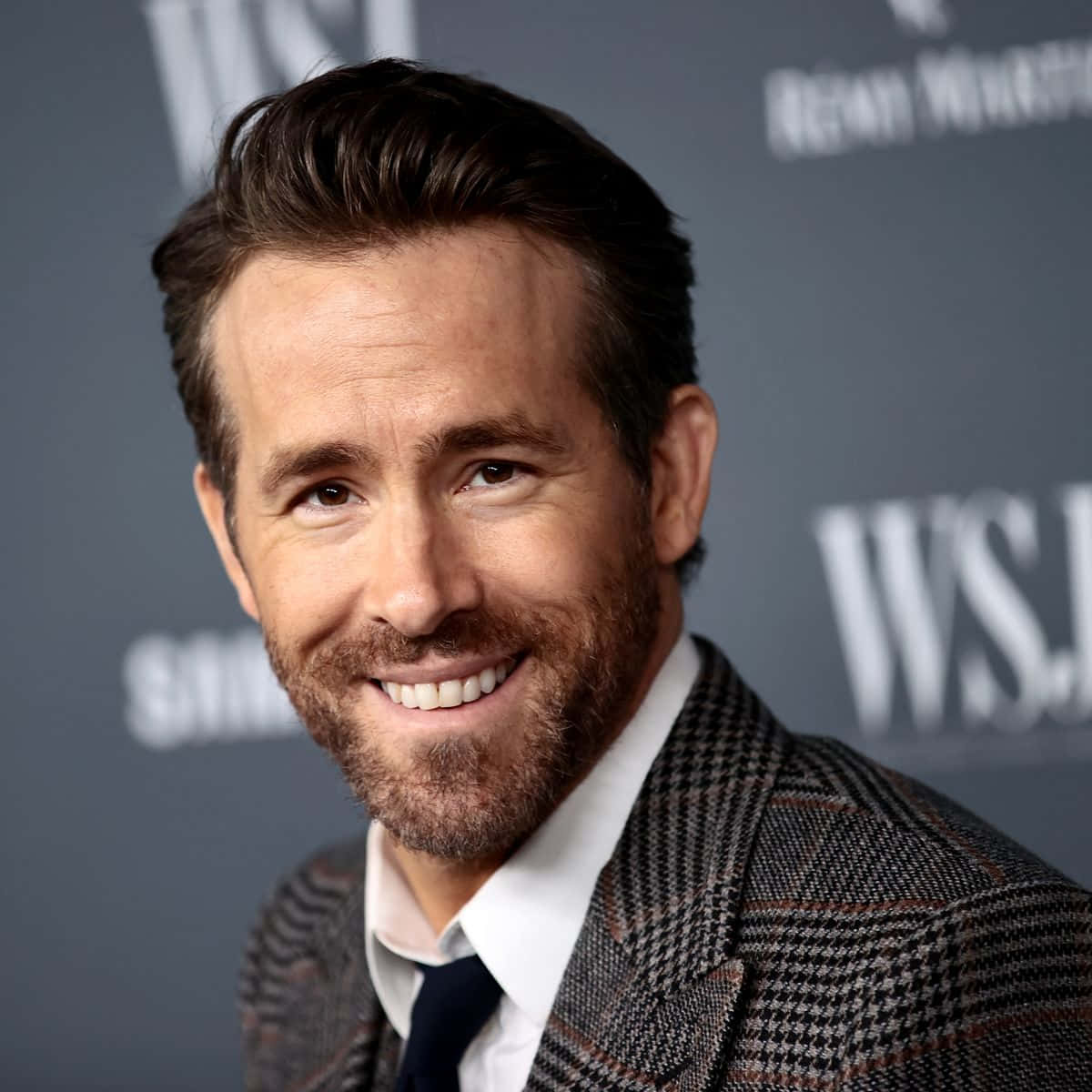 Ryan Reynolds Is Smiling At The Wsl Event