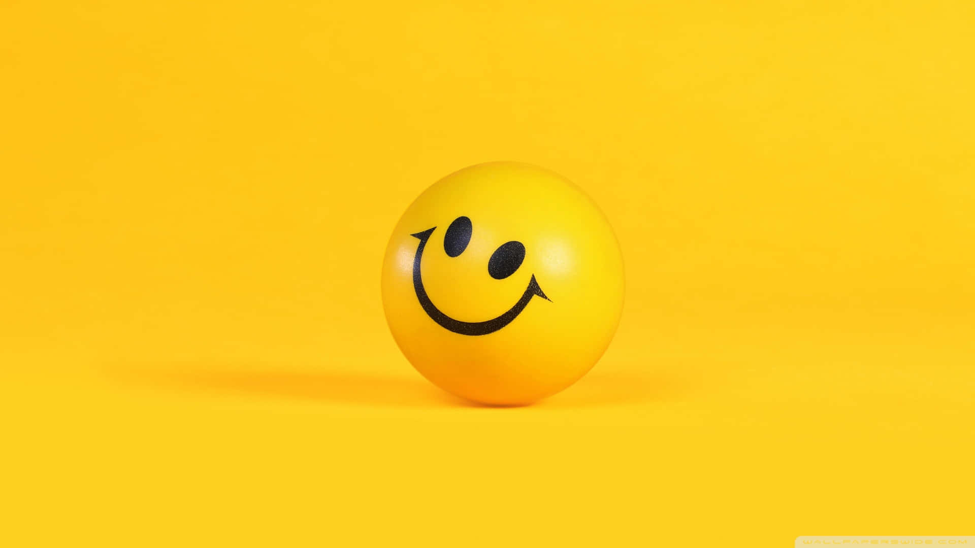 A Cheerful Smiley Face on a Blue Background