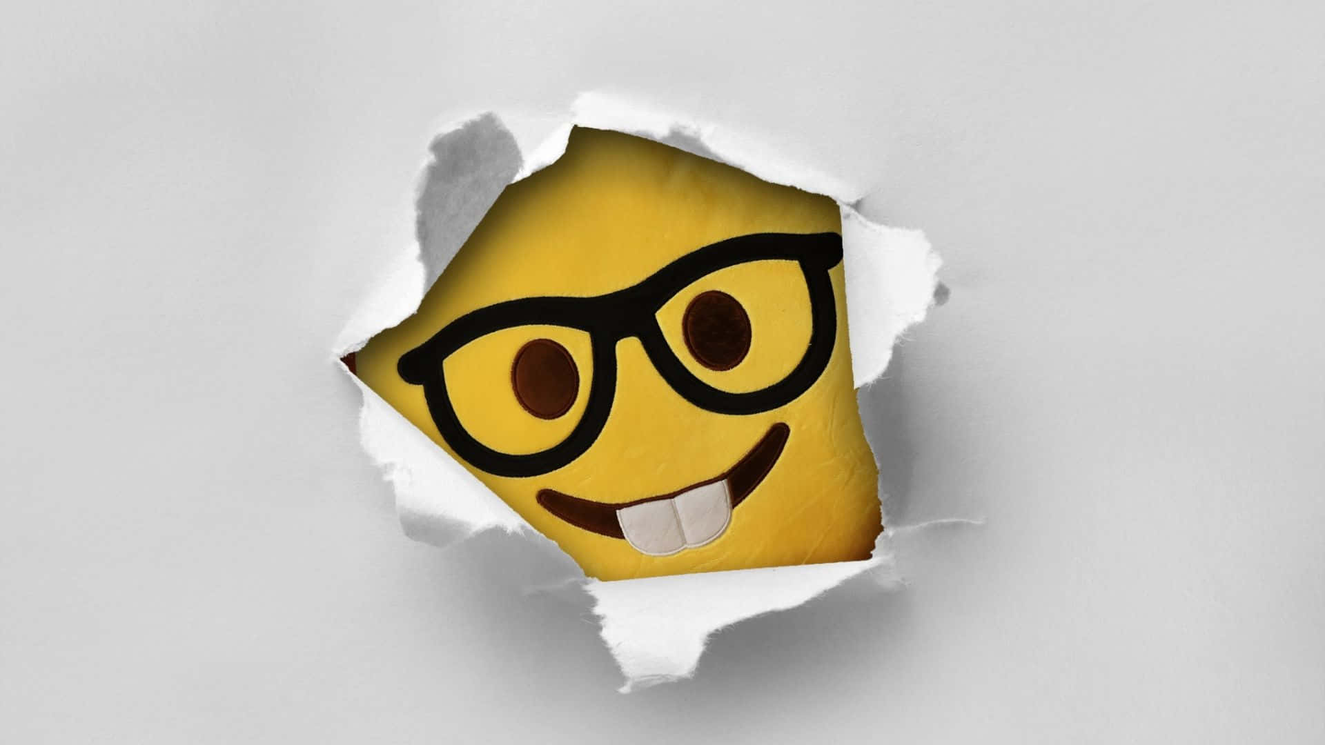 Cheerful Smiley Face on a Vibrant Yellow Background