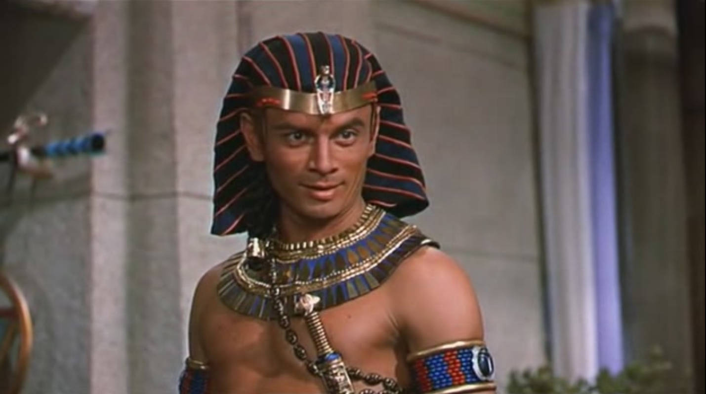 Smiling American Actor Yul Brynner As Pharaoh Ramses Wallpaper