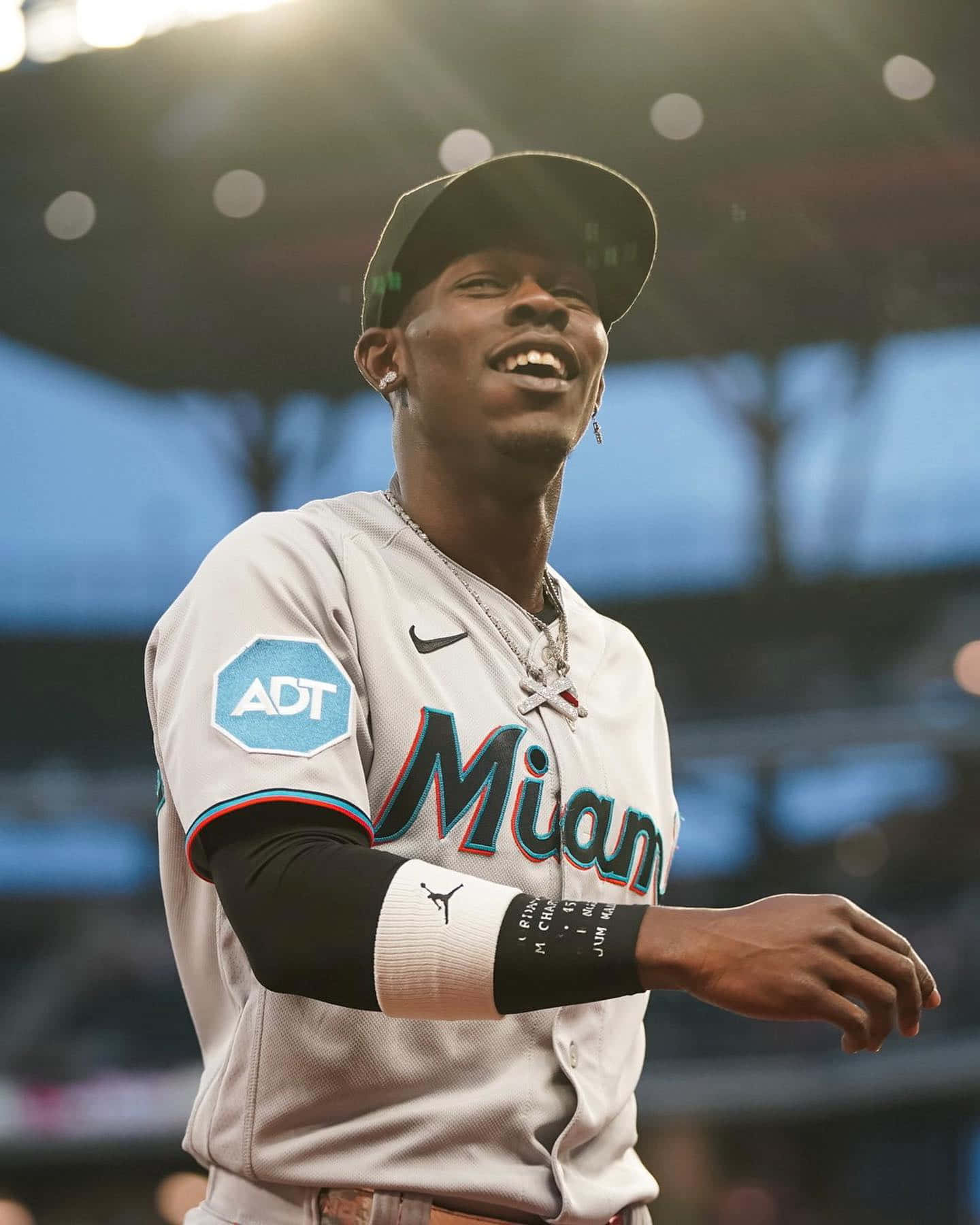 Smiling Baseball Player Miami Uniform Wallpaper