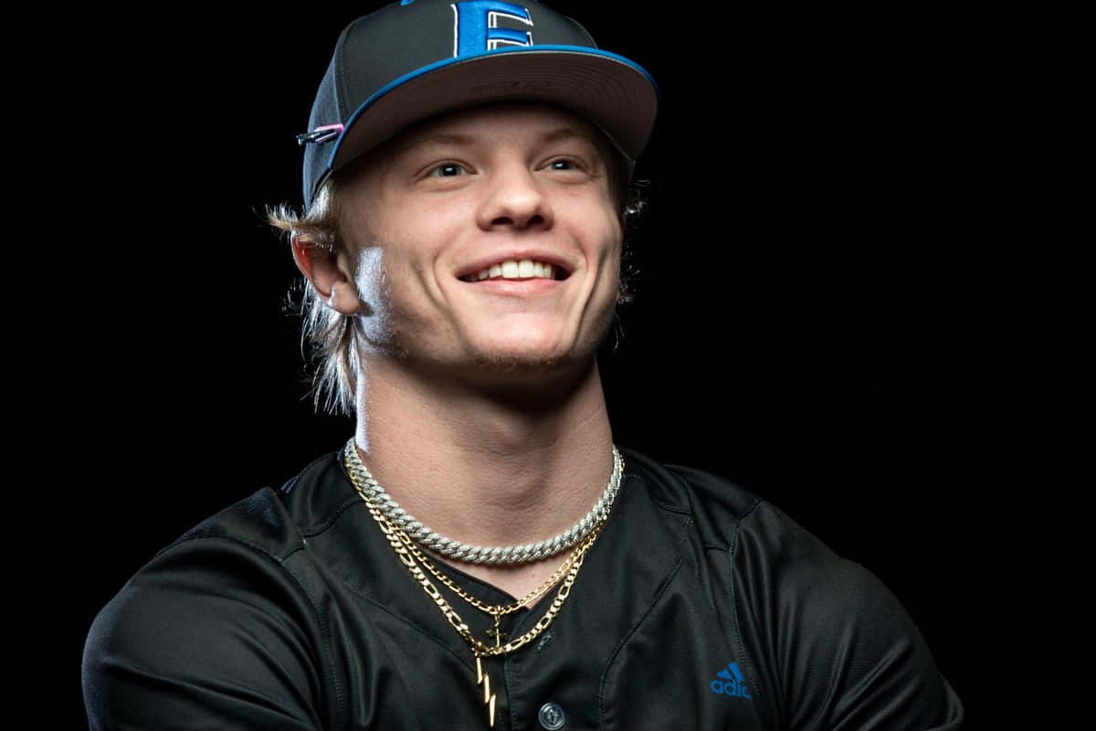 Smiling Baseball Player Portrait Wallpaper