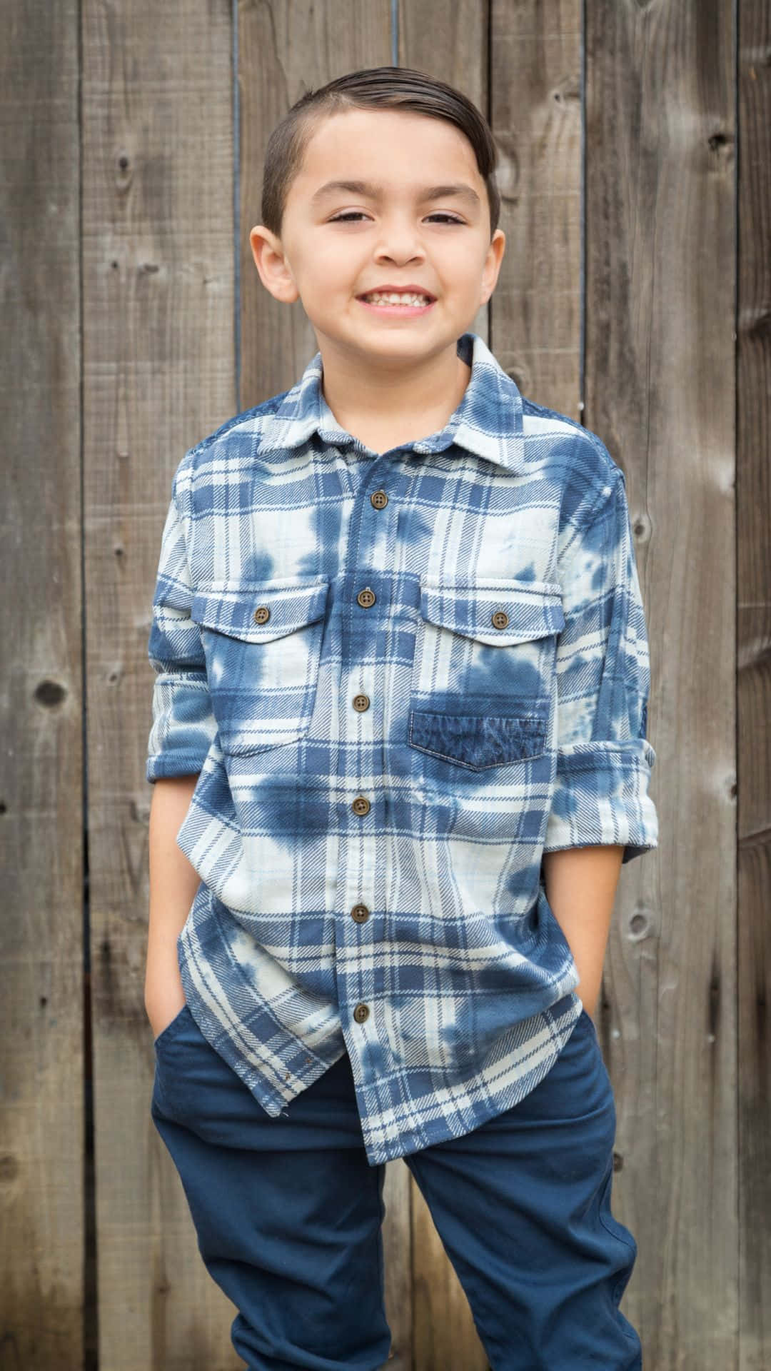 Smiling Boyin Plaid Shirt Wallpaper