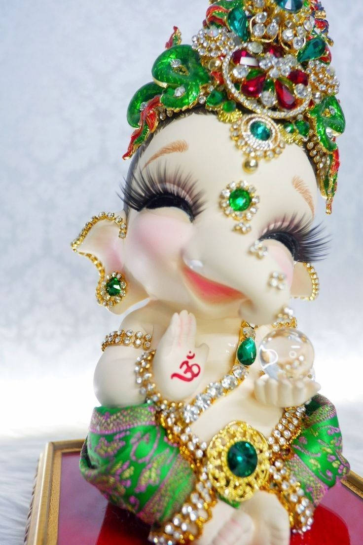 Smiling Cute Baby Ganesh Wallpaper