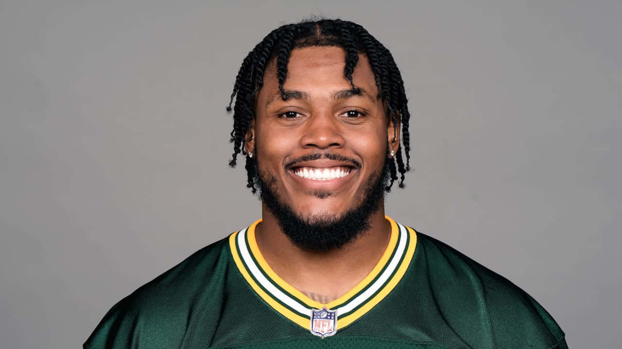 Smiling Football Player Portrait Wallpaper