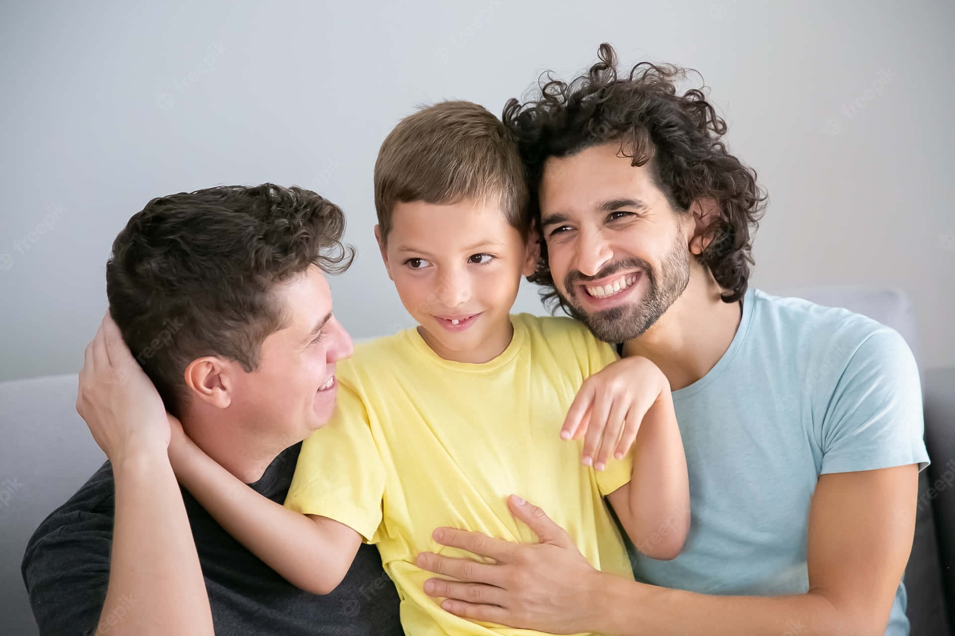 Smiling Gay Boys With A Kid Wallpaper