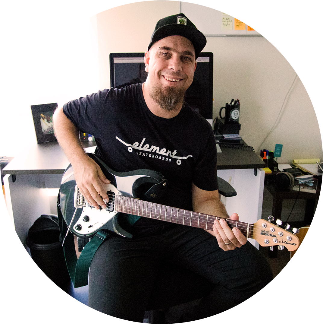 Smiling Guitarist Office Setting PNG