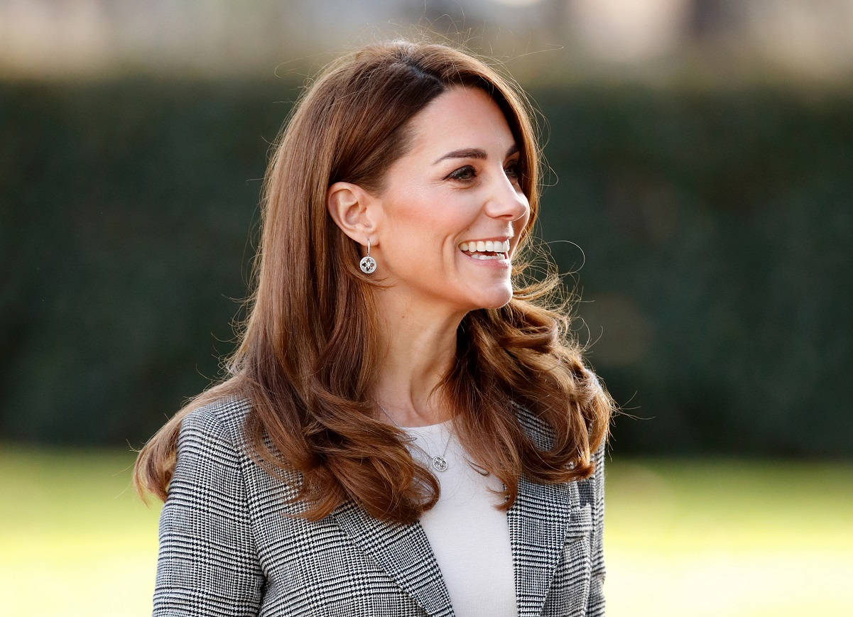 Smiling Kate Middleton Side-View Wallpaper