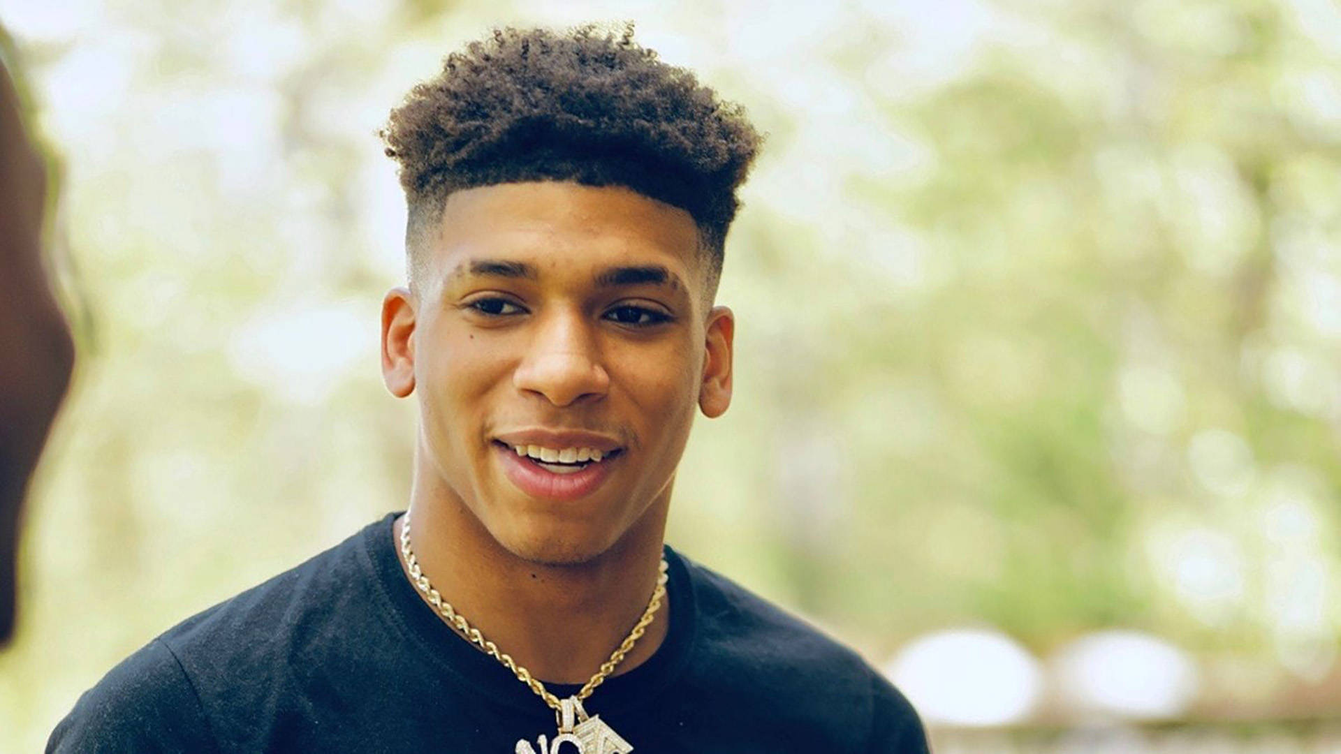 NLE Choppa with a Bright Smile Wallpaper