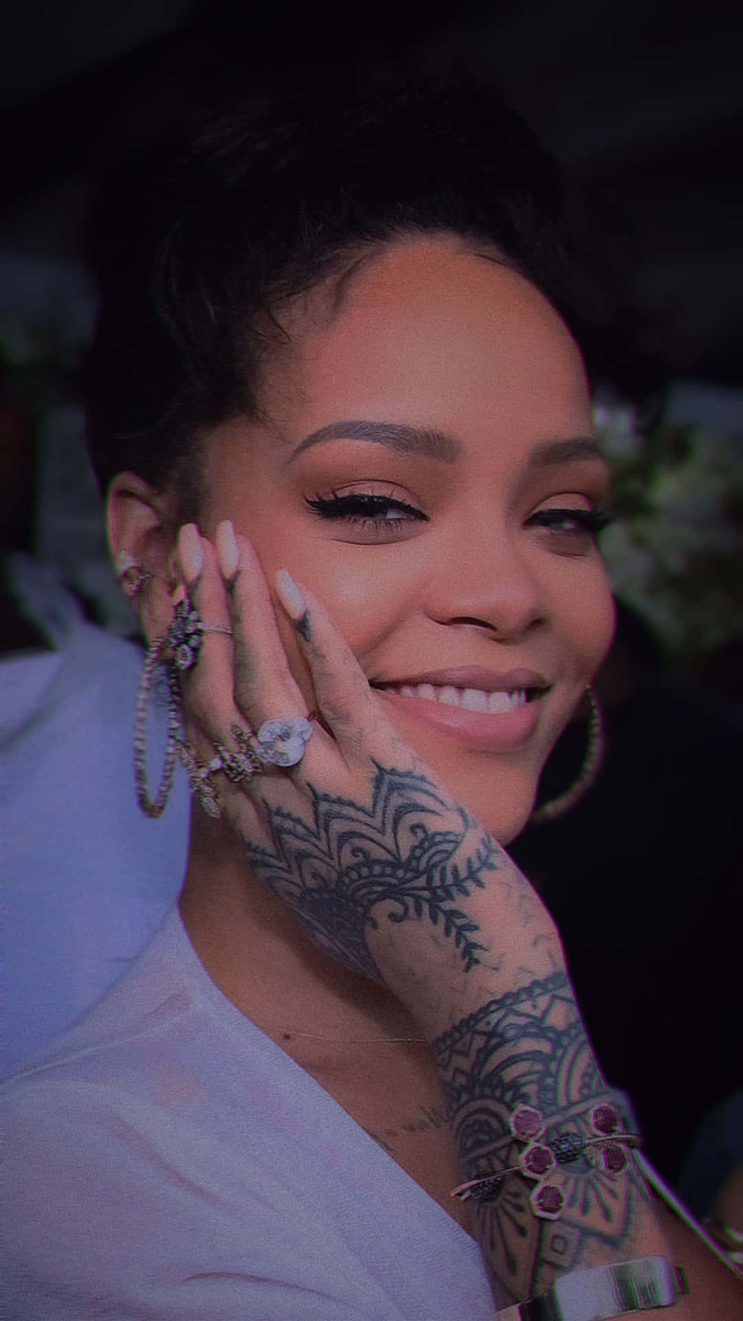 Smiling Rihanna With Hand Tattoo Background