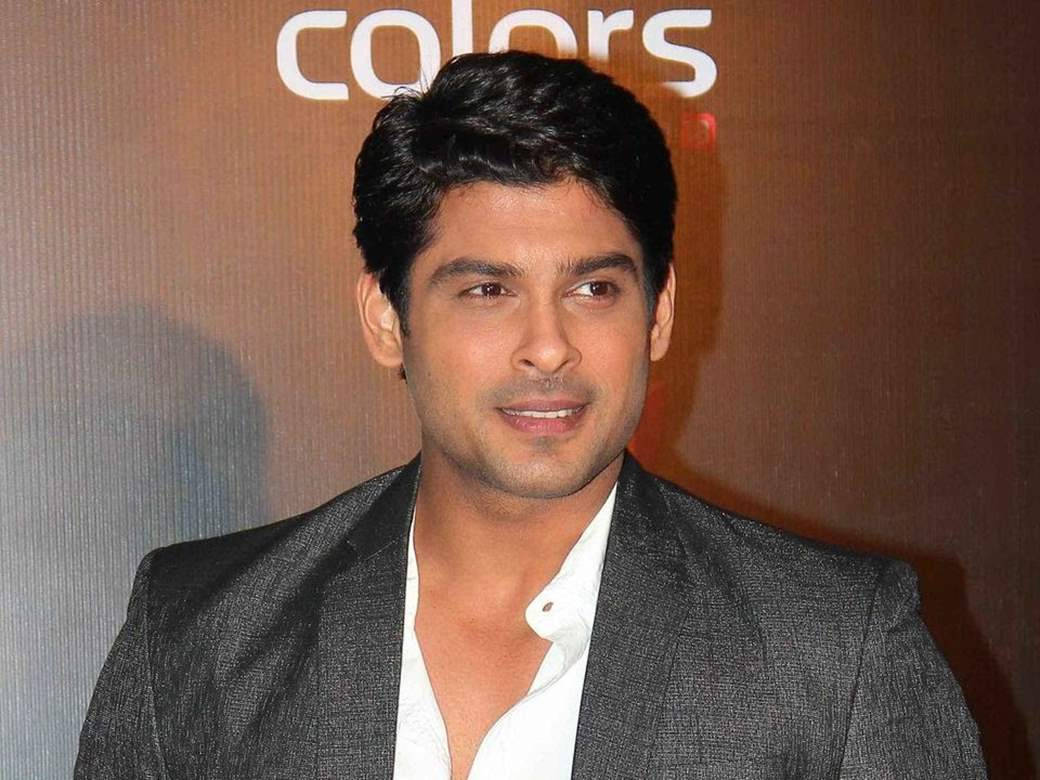Smiling Sidharth Shukla In Black Suit Close-up Wallpaper