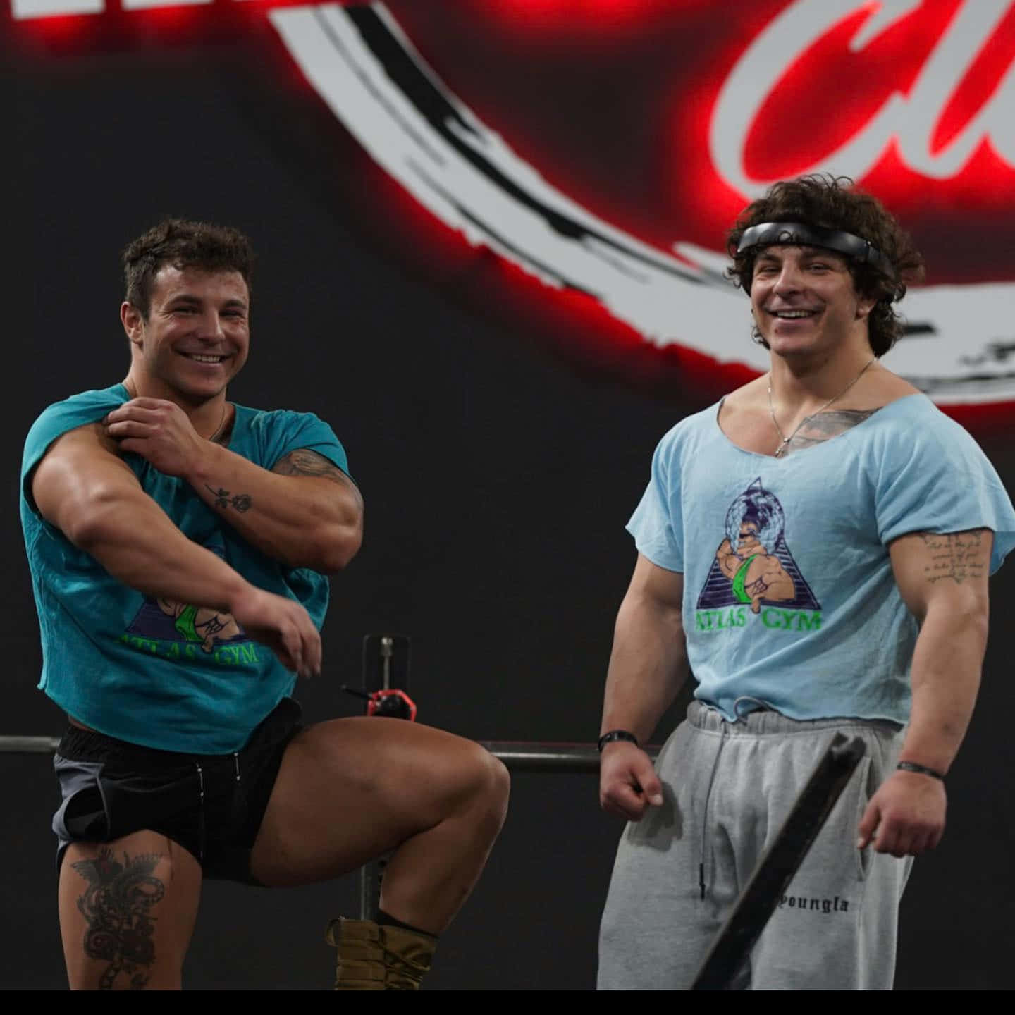 Smiling Twin Brothers Fitness Session Wallpaper