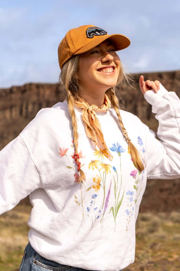 Smiling Woman Floral Sweatshirt Outdoors Wallpaper
