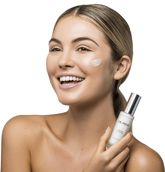 Smiling Woman Skincare Product Demonstration PNG