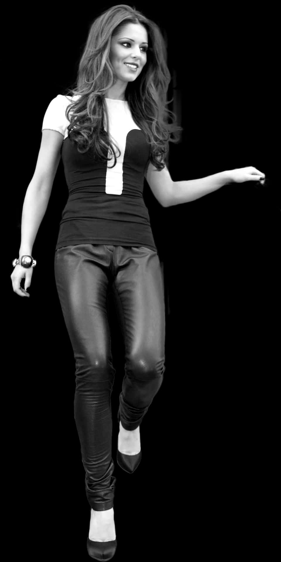 Smiling Womanin Blackand White Outfit PNG