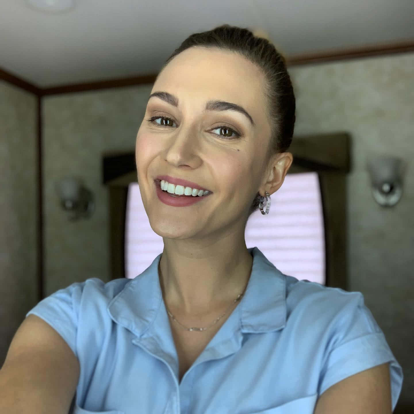 Smiling Womanin Blue Shirt Selfie Wallpaper
