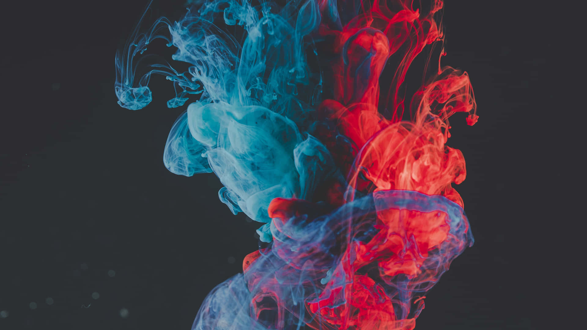 Red And Blue Smoke In Grunge Background