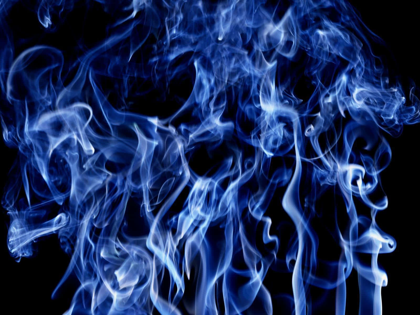 Blue Smoke Rising Against a Starry Night Wallpaper